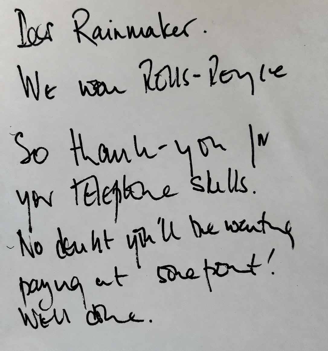 Handwritten note about Los Rainmakers thanking for telephone skills and mentioning no doubt about parking at some point.