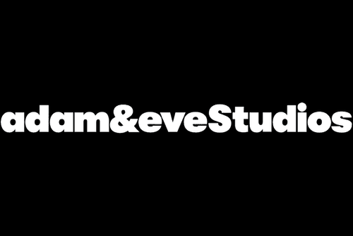 Black background with white text reading 'adam&eveStudios' in lowercase and mixed case.