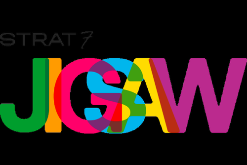 Colorful JCSW logo with overlapping letters in green, red, pink, blue, yellow, and purple, and the word 'STRAT7' above in gray.