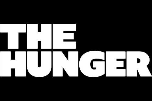 Text saying 'The Hunger' in bold white letters on a black background.
