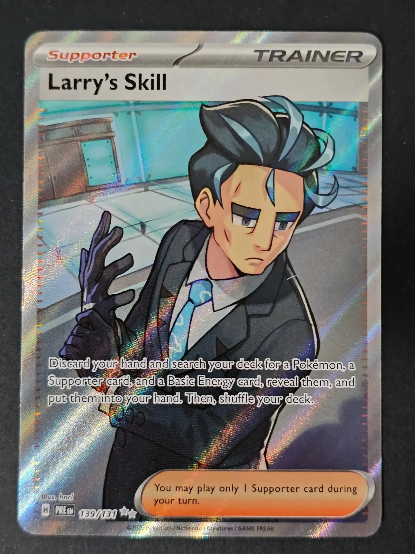 Larry's Skill 139/131 - Ultra Rare Pokemon Prismatic Evolutions