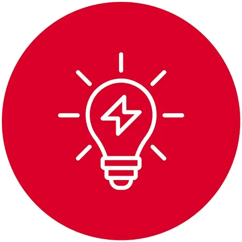 Icon of a light bulb with a lightning bolt inside, surrounded by rays on a red circular background.