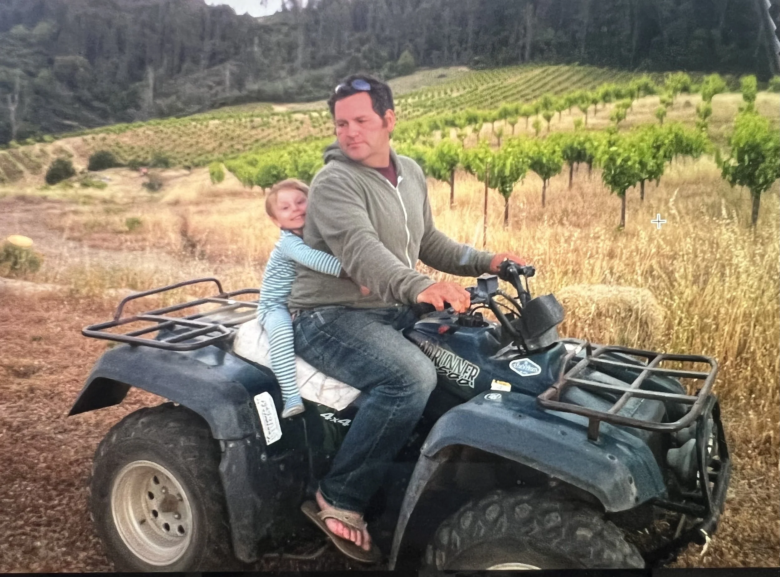 Cousin teaching the next generation how to farm