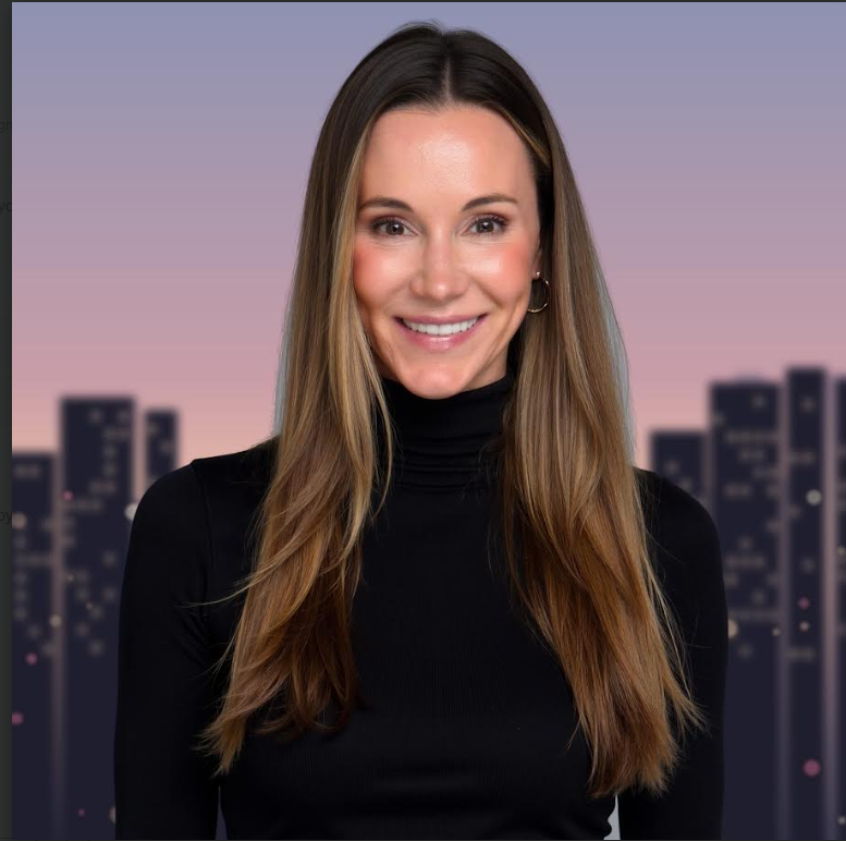 Lauren Elias, beauty and wellness executive and speaker, in a black turtleneck against a gray studio background