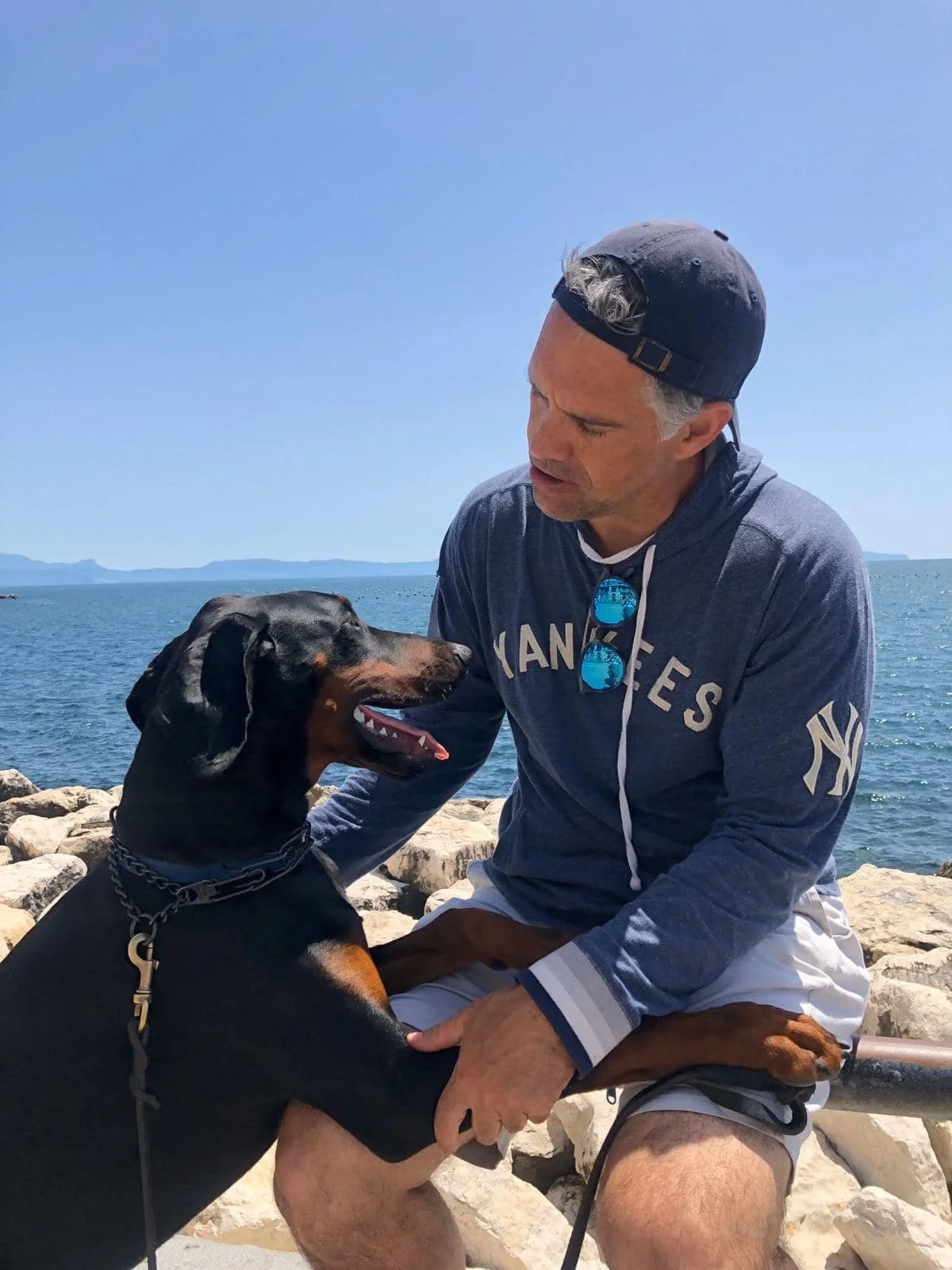 Scott Walters with Vito, the Labrador whose companionship helped save Scott’s life and inspired the 112 Mission.