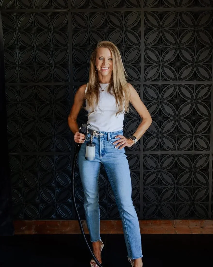 Kendell, founder and certified spray tan artist, in the studio