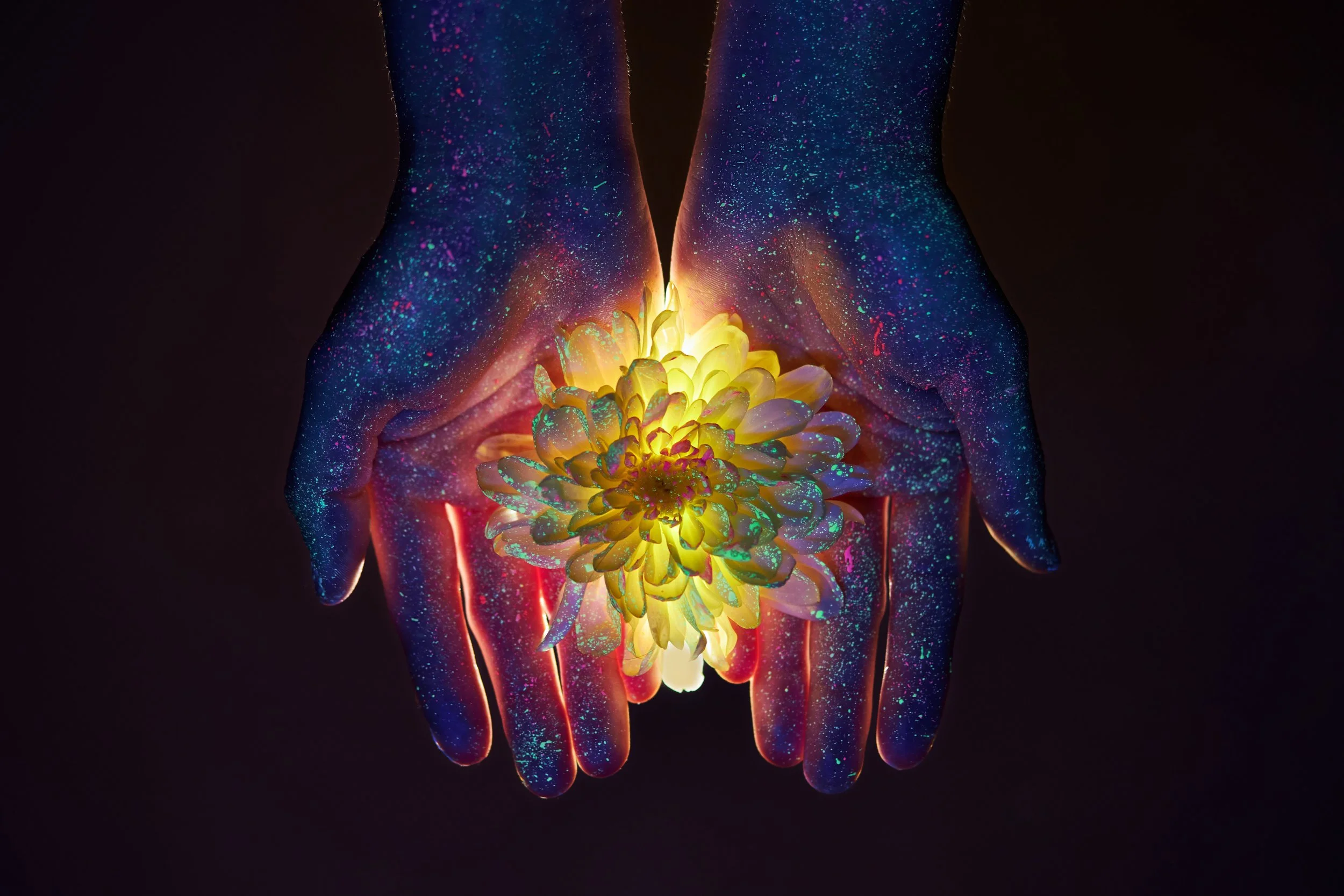 radiant-flower-held-in-painted-hands-2026-03-19-03-15-20-utc.jpg