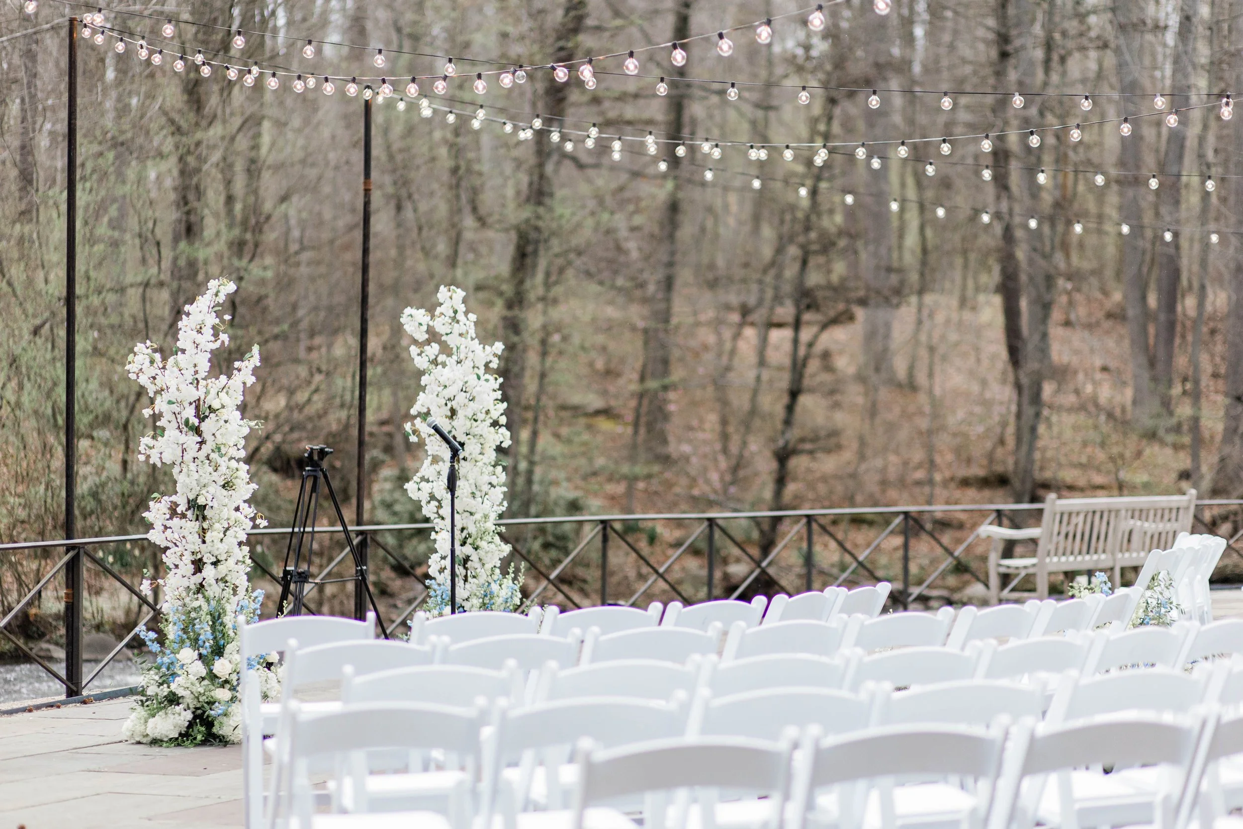 Ceremony shot, Open broken Ceremony Arch, White Cherry Blossoms, String Lights, Ceremony Inspiration
