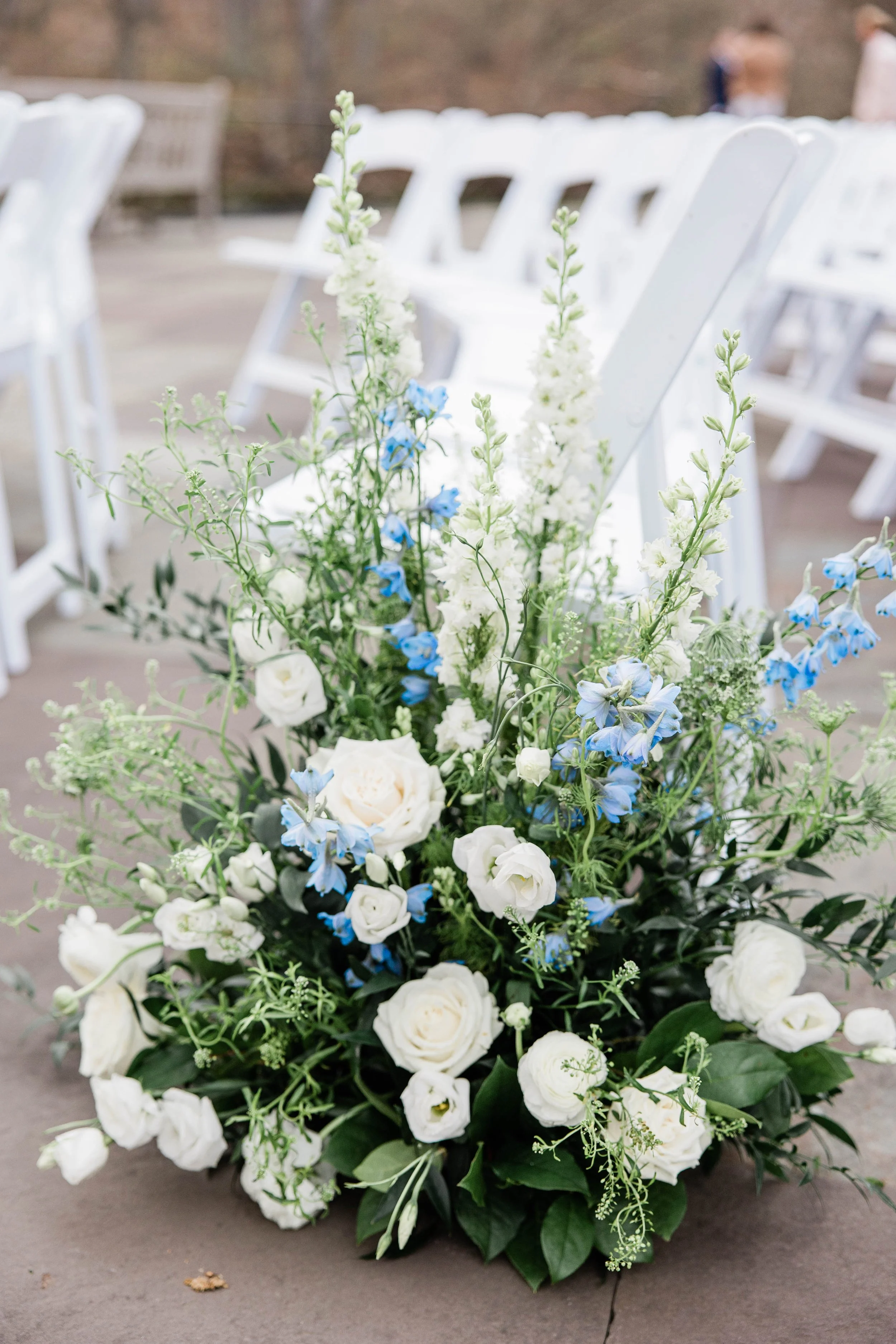 Ceremony Aisle Decor, White Florals accented with touches of Light Blue Delphinium