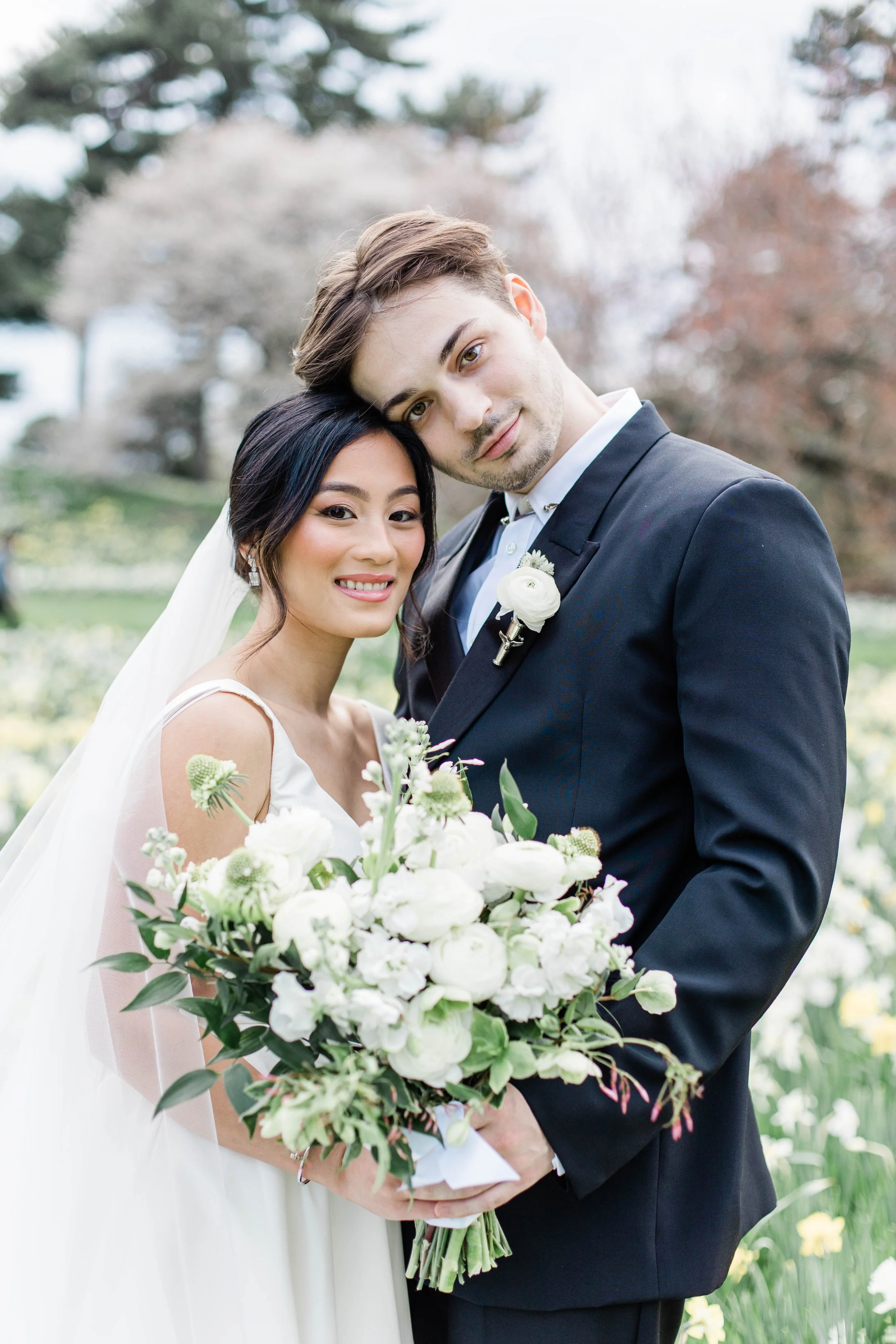 Bride and Groom with her bouquet and his boutineer