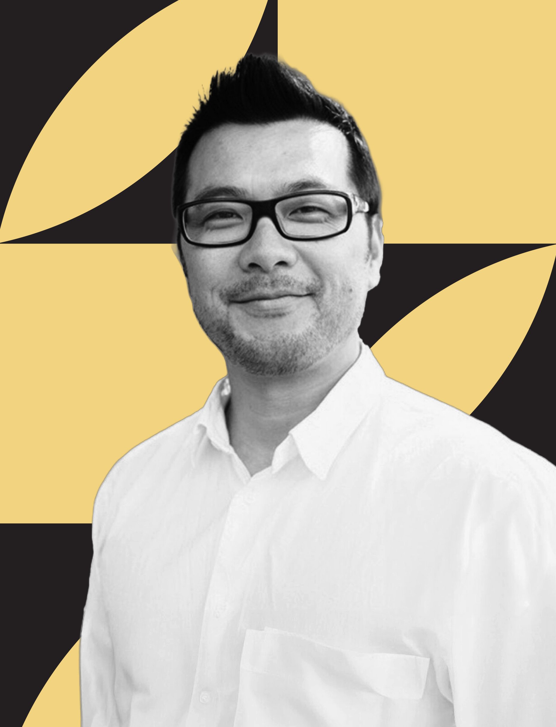 A black-and-white portrait of a man with glasses, smiling, wearing a button-down shirt, with a graphic yellow and black background.