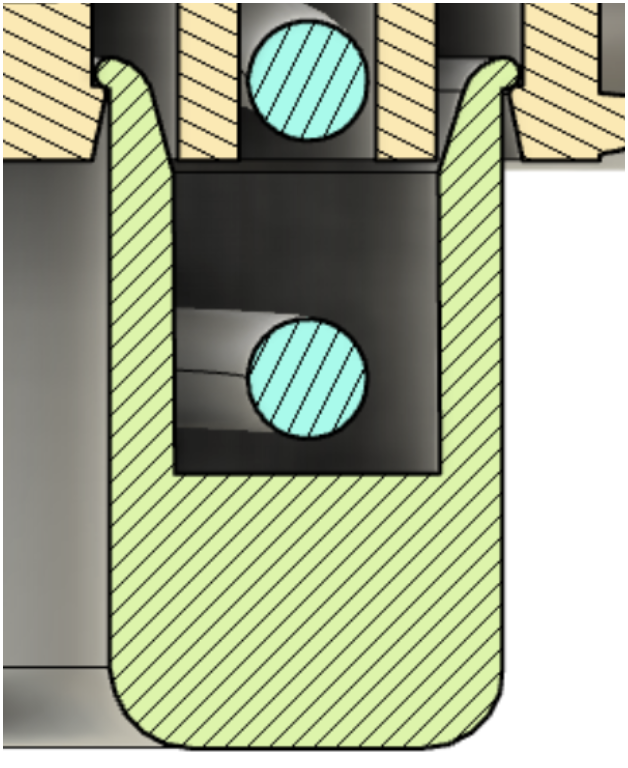Close-up of a mechanical component showing a cross-sectional view of a piston and cylinder with blue and black parts, including green and brown structural elements.