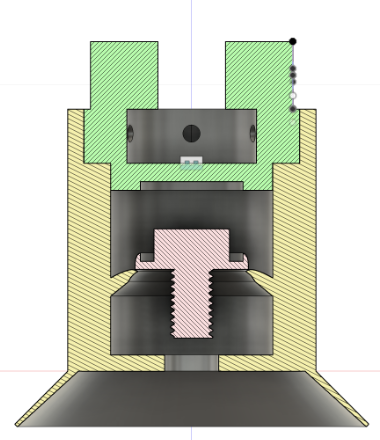 Cross-sectional illustration of a mechanical device, showing internal components including a pink threaded screw, a black outer casing, and colored sections in green, yellow, black, and pink.