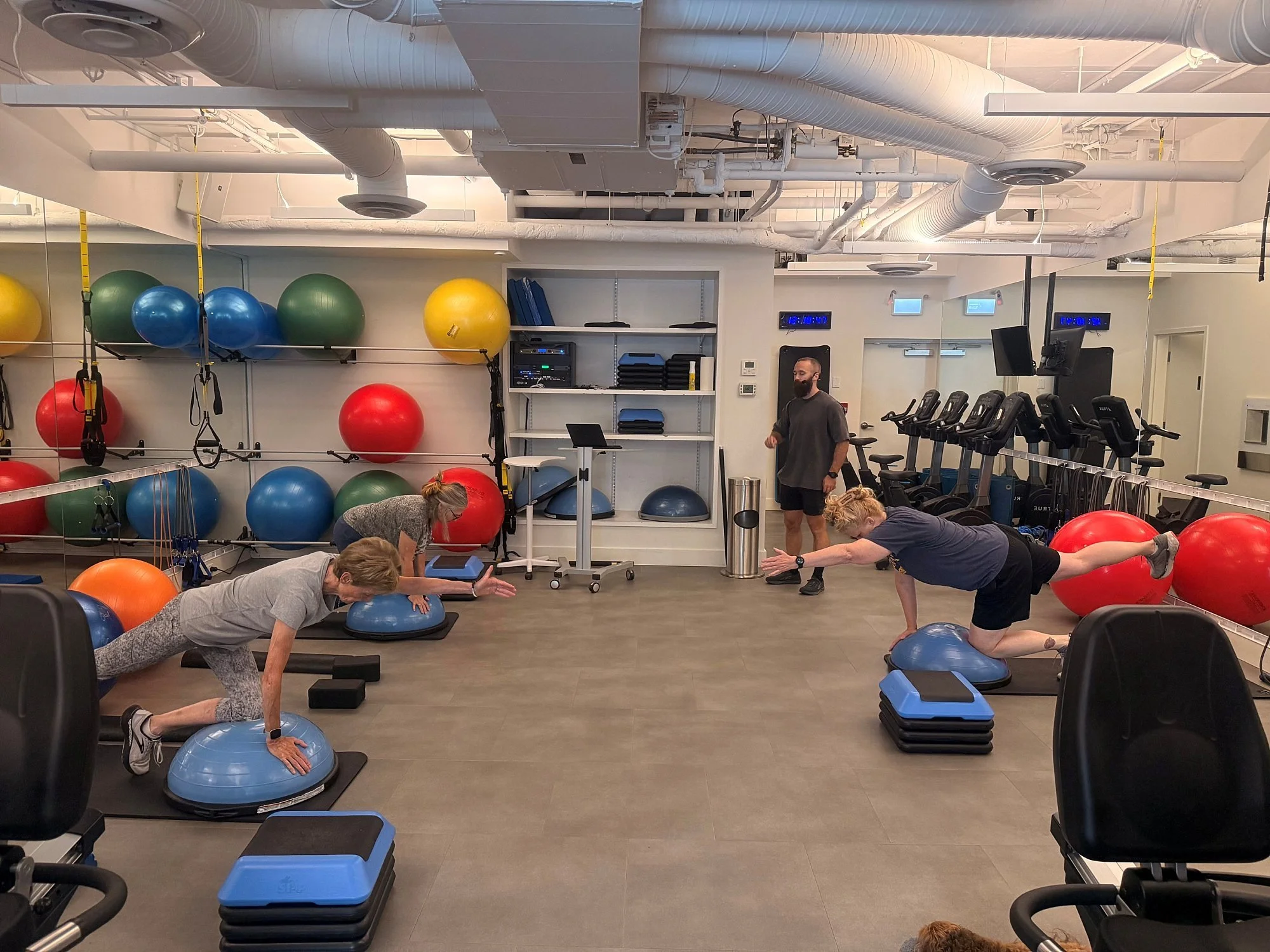 Small group osteoporosis exercise class using weights and resistance in North Vancouver