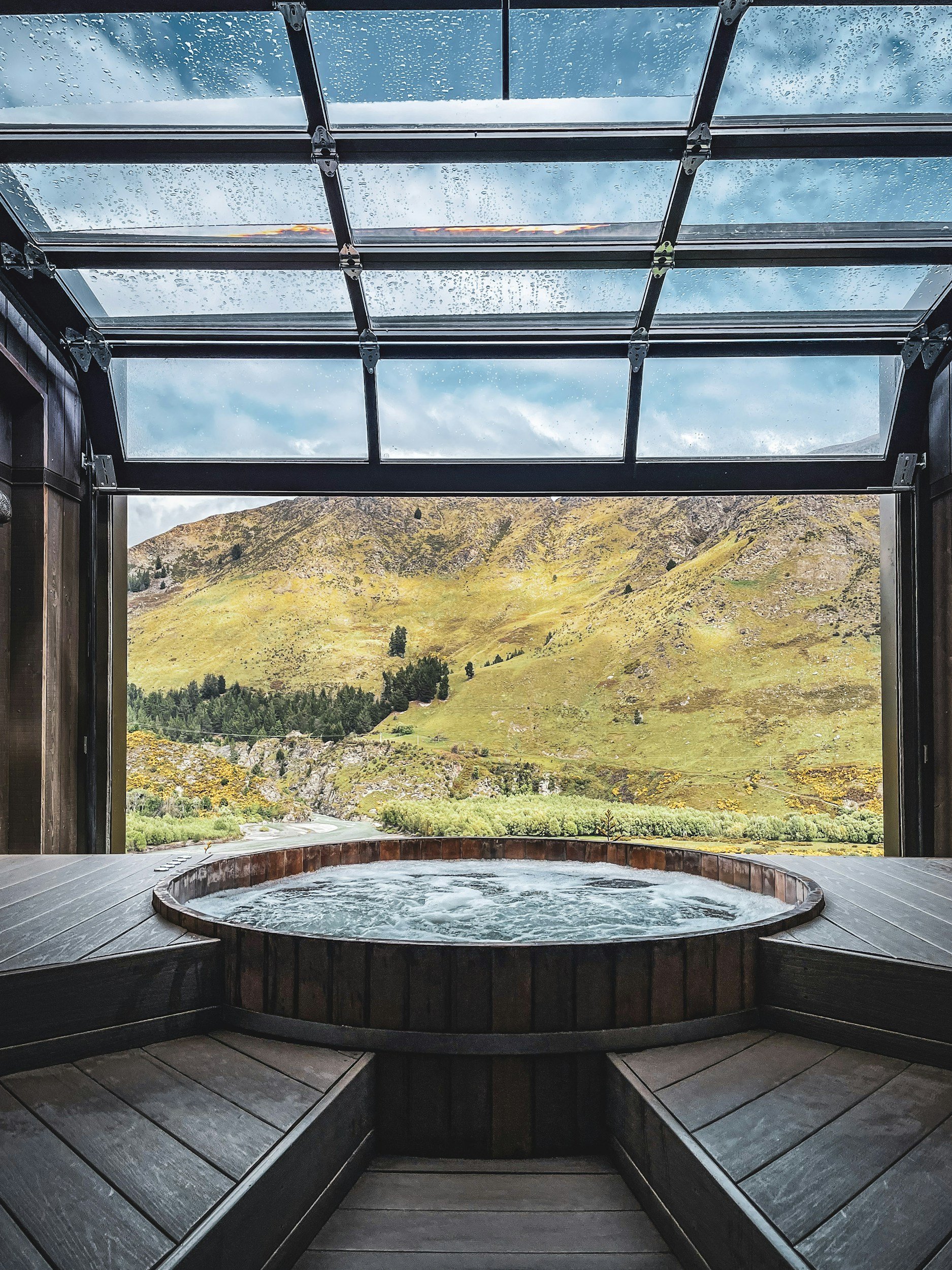 Outdoor hot tub overlooking mountains, personal add-on to a business trip