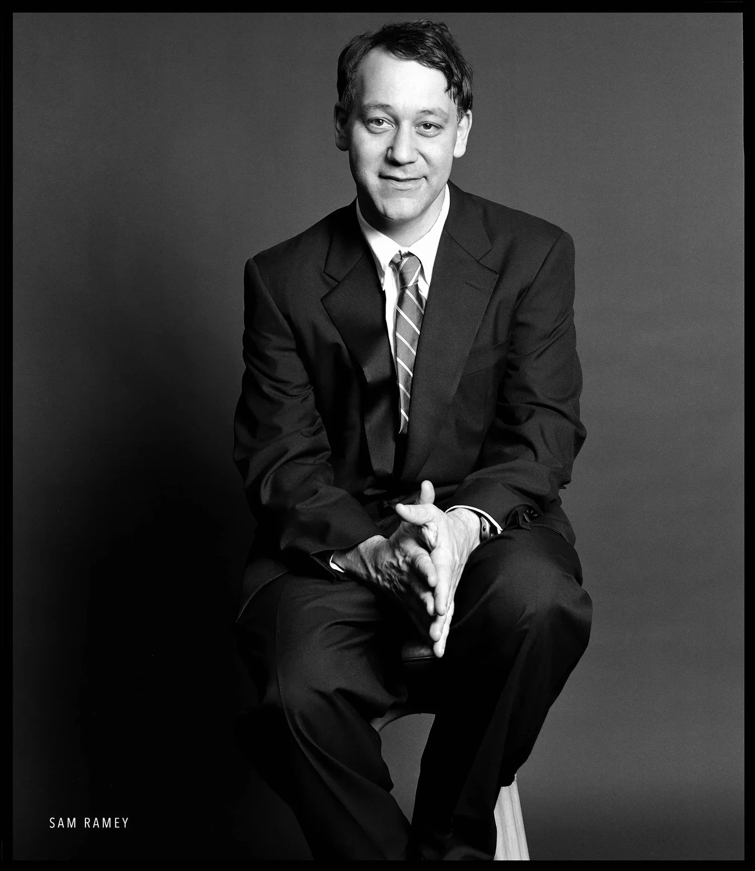 Acclaimed film director Sam Raimi black and white studio portrait photographed by Ken Sax Corporate Photography LA.