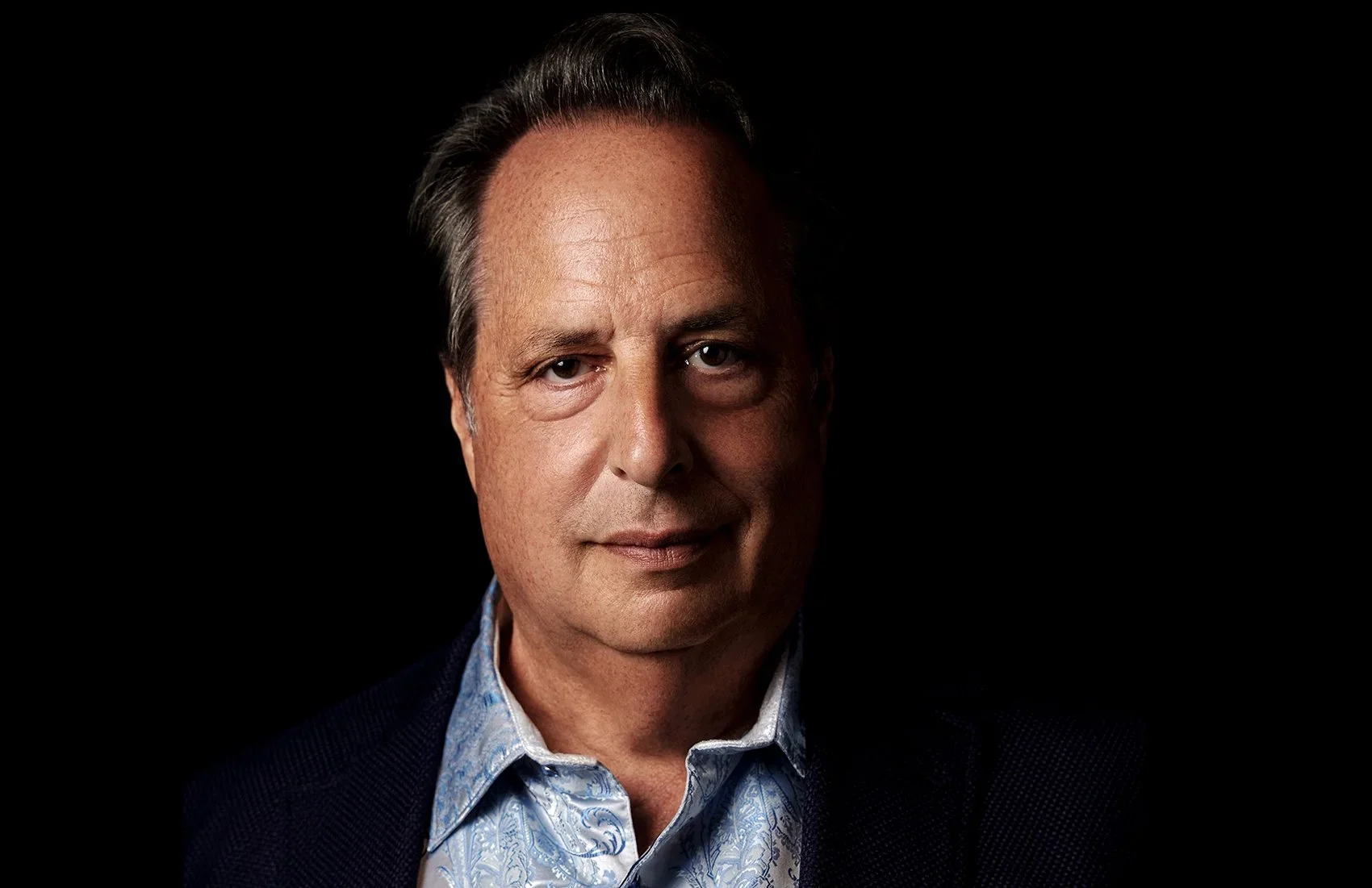 Comedian and actor Jon Lovitz dramatic studio portrait photographed by Ken Sax in Los Angeles.