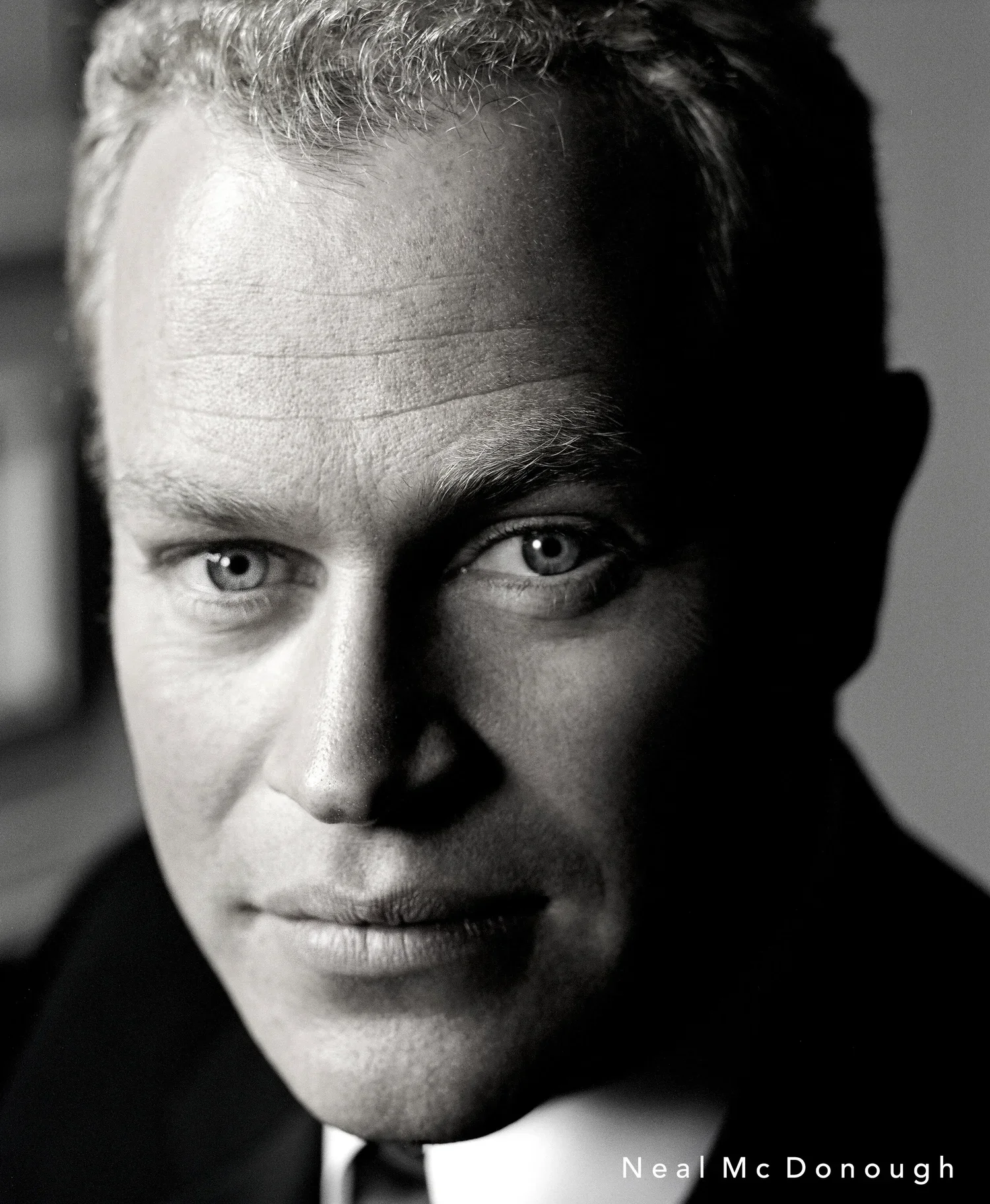 Actor Neal McDonough dramatic black and white studio portrait photographed by Ken Sax.