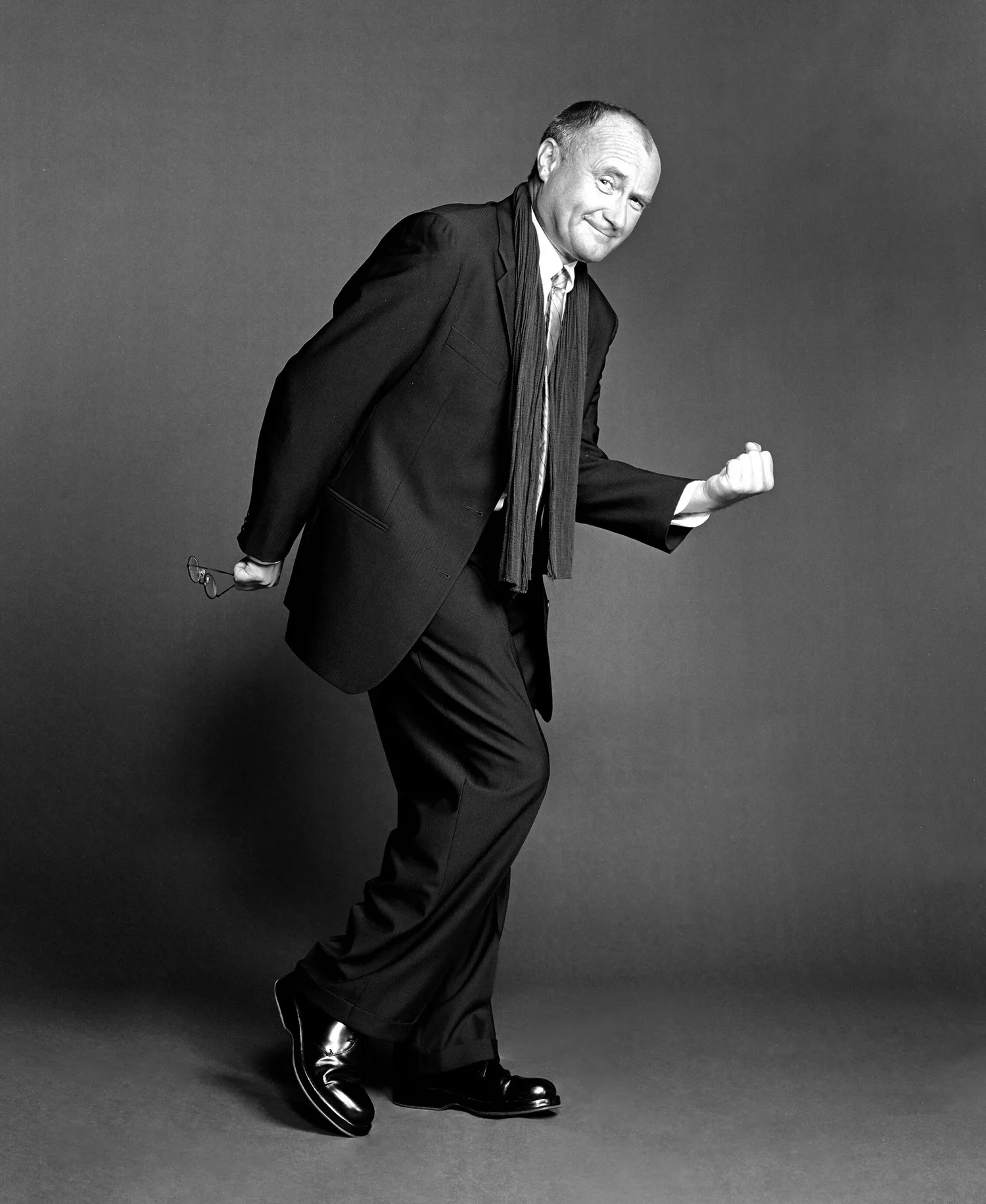 Legendary musician Phil Collins dynamic studio portrait photographed by Ken Sax.