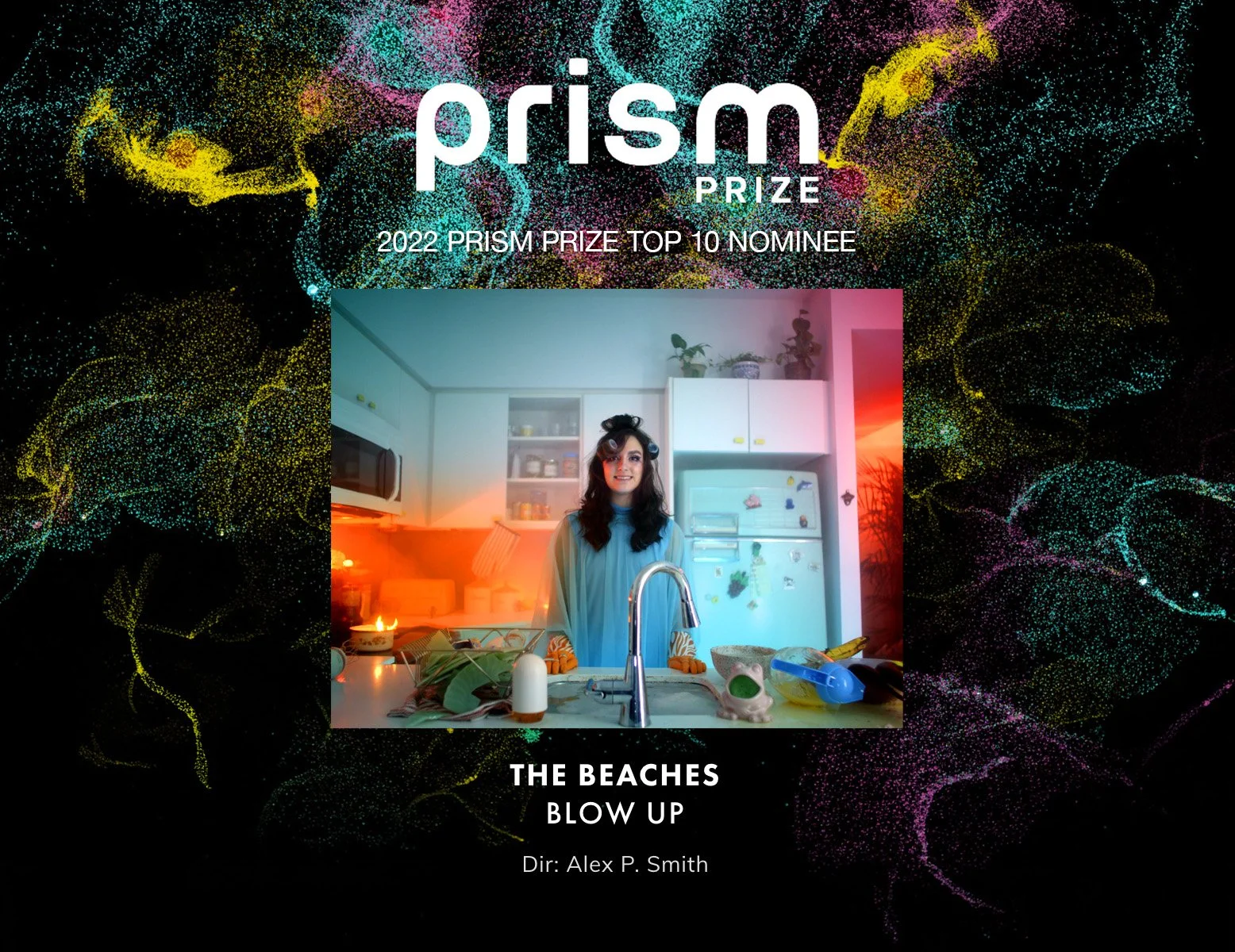 An award certificate for the 2022 Prism Prize Top 10 Nominee with a colorful, galaxy-like background. It features a smaller inset photo of a woman in a light blue dress standing in a kitchen, with various kitchen items on the counter.