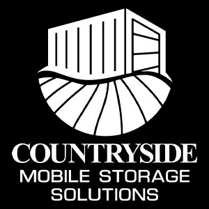 A black background with a white logo featuring a barn and silo, and text reading "COUTNSIDE MOBILE STORAGE SOLUTIONS."