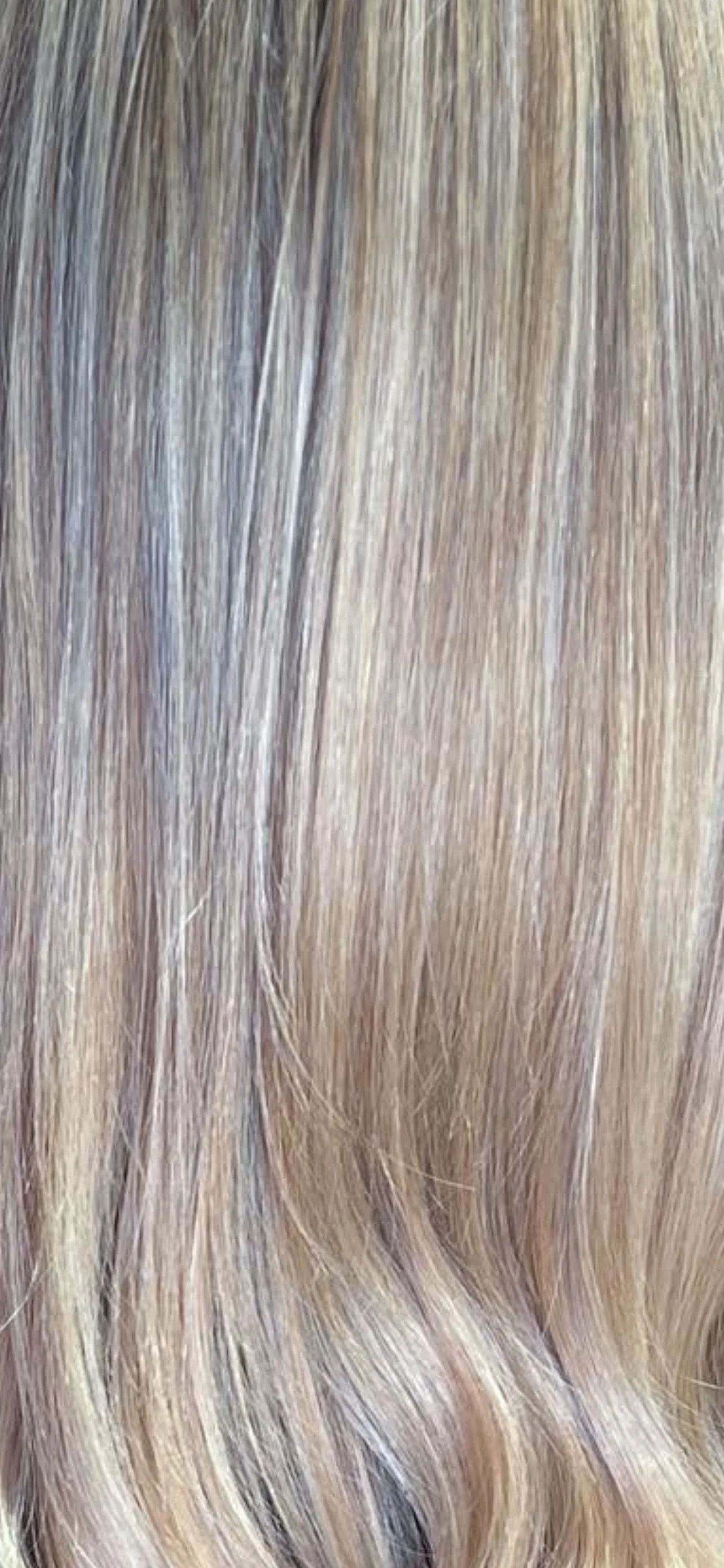 Pearly blonde hair color transformation, showcasing a stunning result by Dalina Rivas.