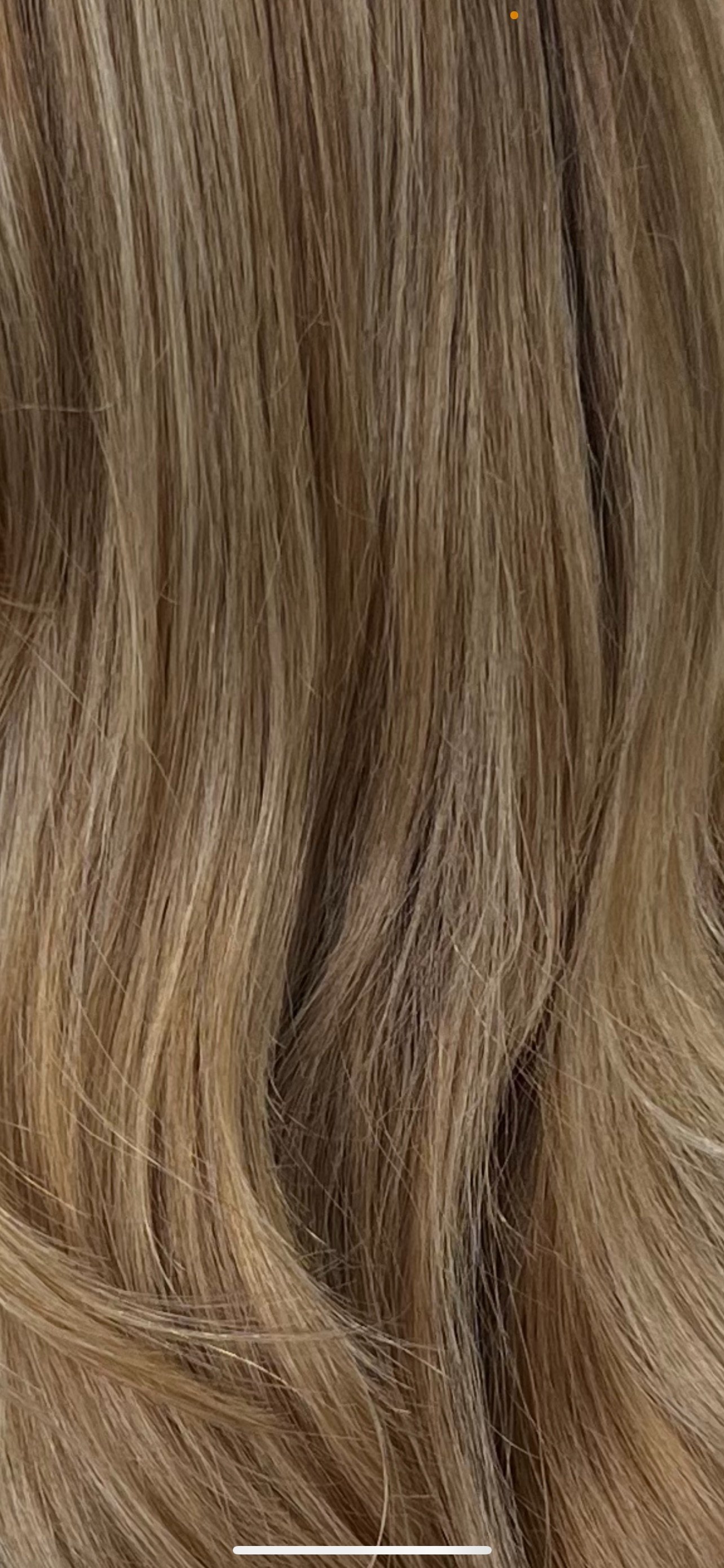 Muted Caramel hair color transformation, showcasing a stunning result by Dalina Rivas.