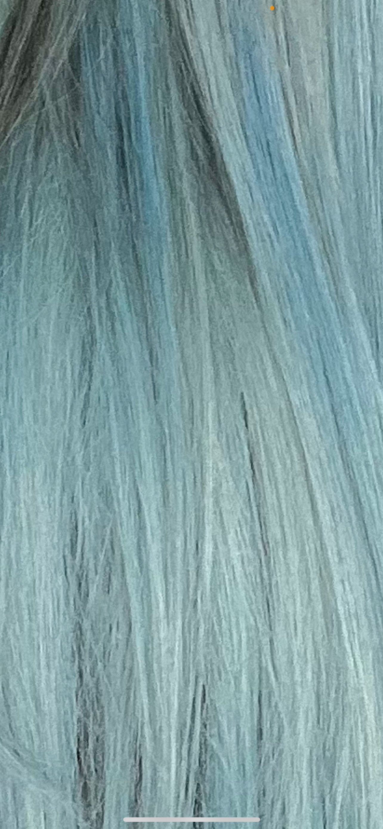 Bright Sky Blue hair color transformation, showcasing a stunning result by Dalina Rivas.