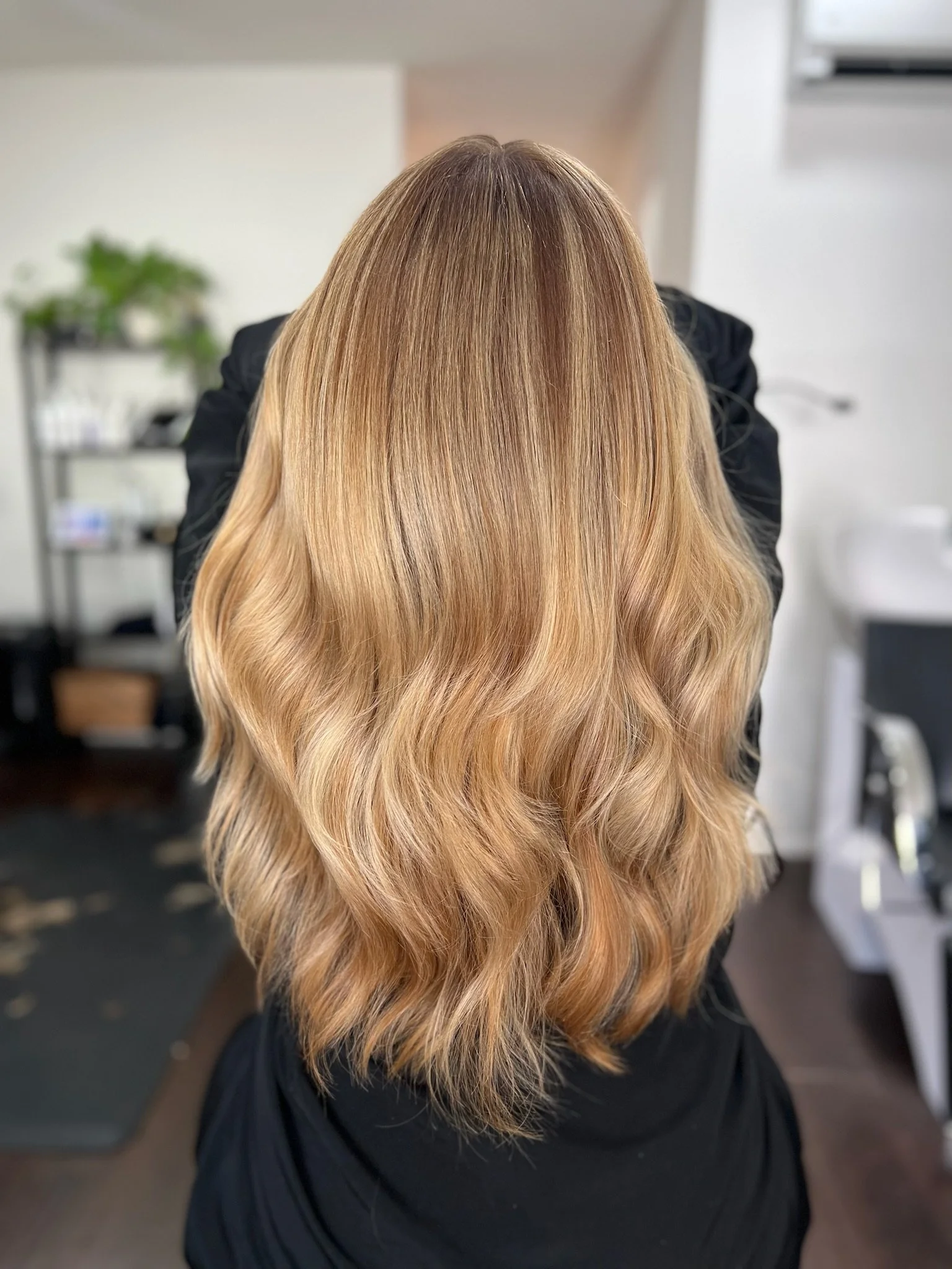 Completed hair transformation by Dalina Rivas featuring custom hair color, personalized haircut, and healthy hair treatment.