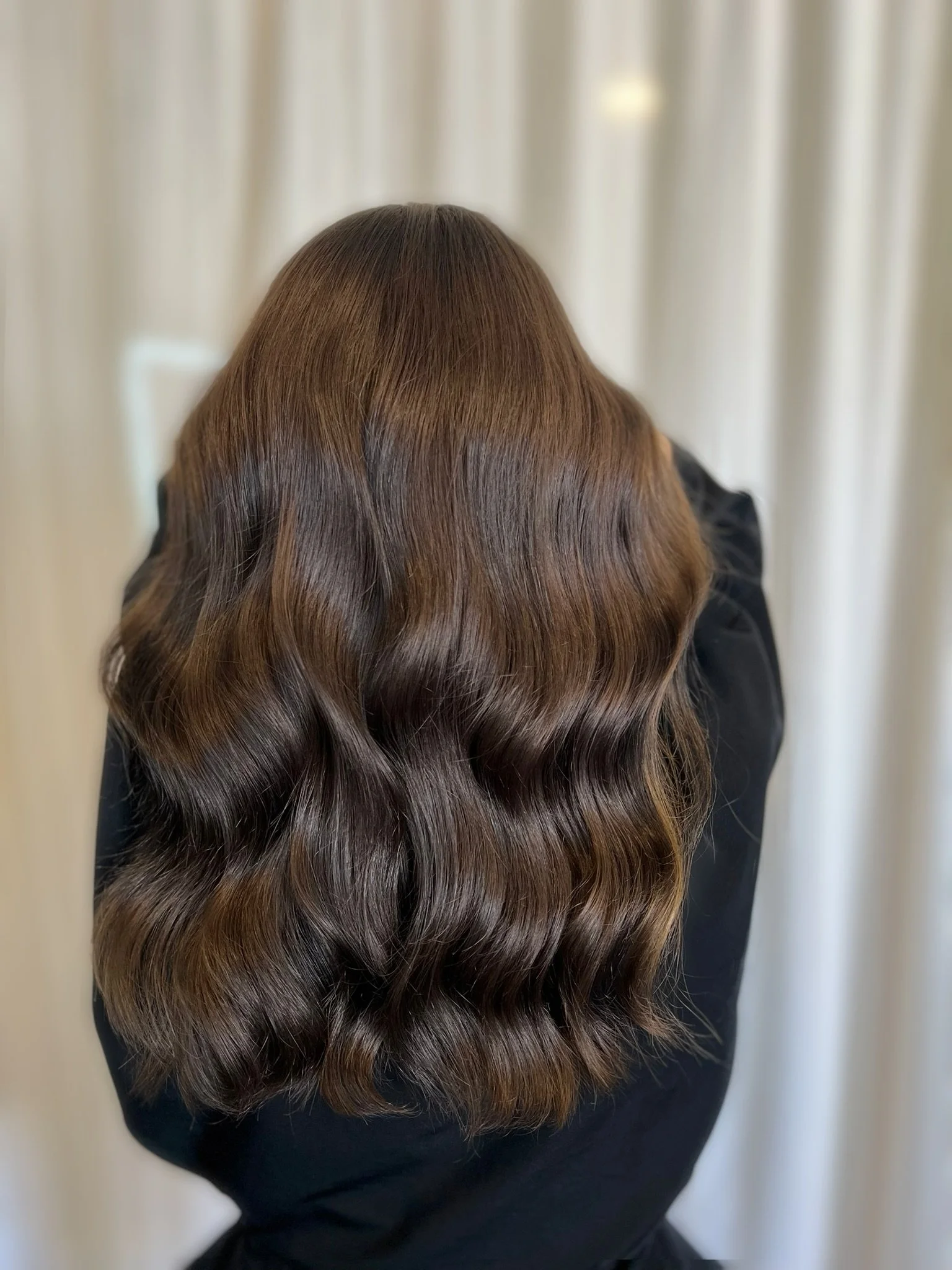 Completed hair transformation by Dalina Rivas featuring custom hair color, personalized haircut, and healthy hair treatment.
