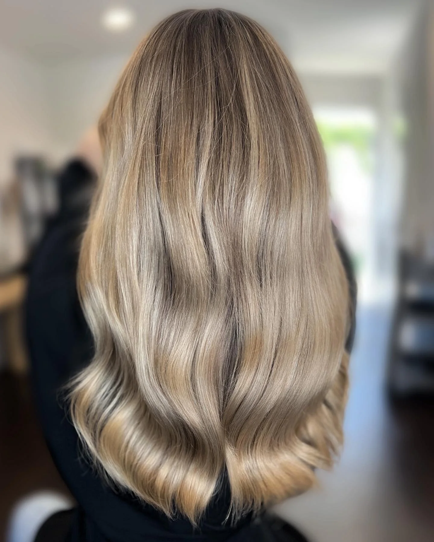 Completed hair transformation by Dalina Rivas featuring custom hair color, personalized haircut, and healthy hair treatment.