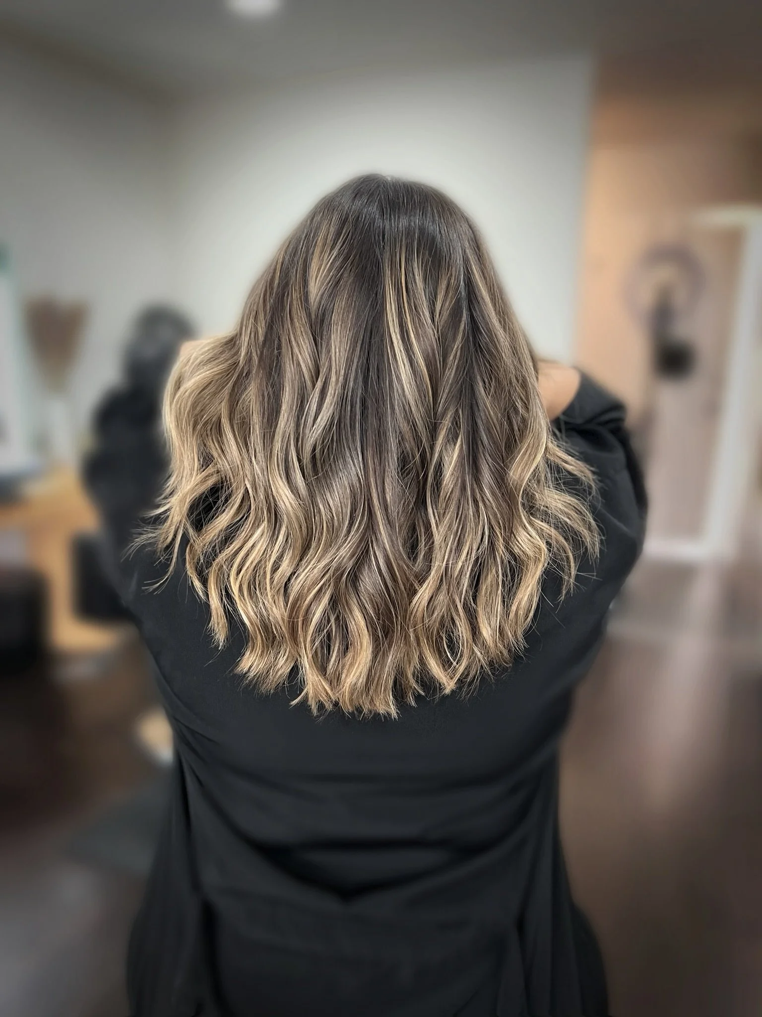 Completed hair transformation by Dalina Rivas featuring custom hair color, personalized haircut, and healthy hair treatment.