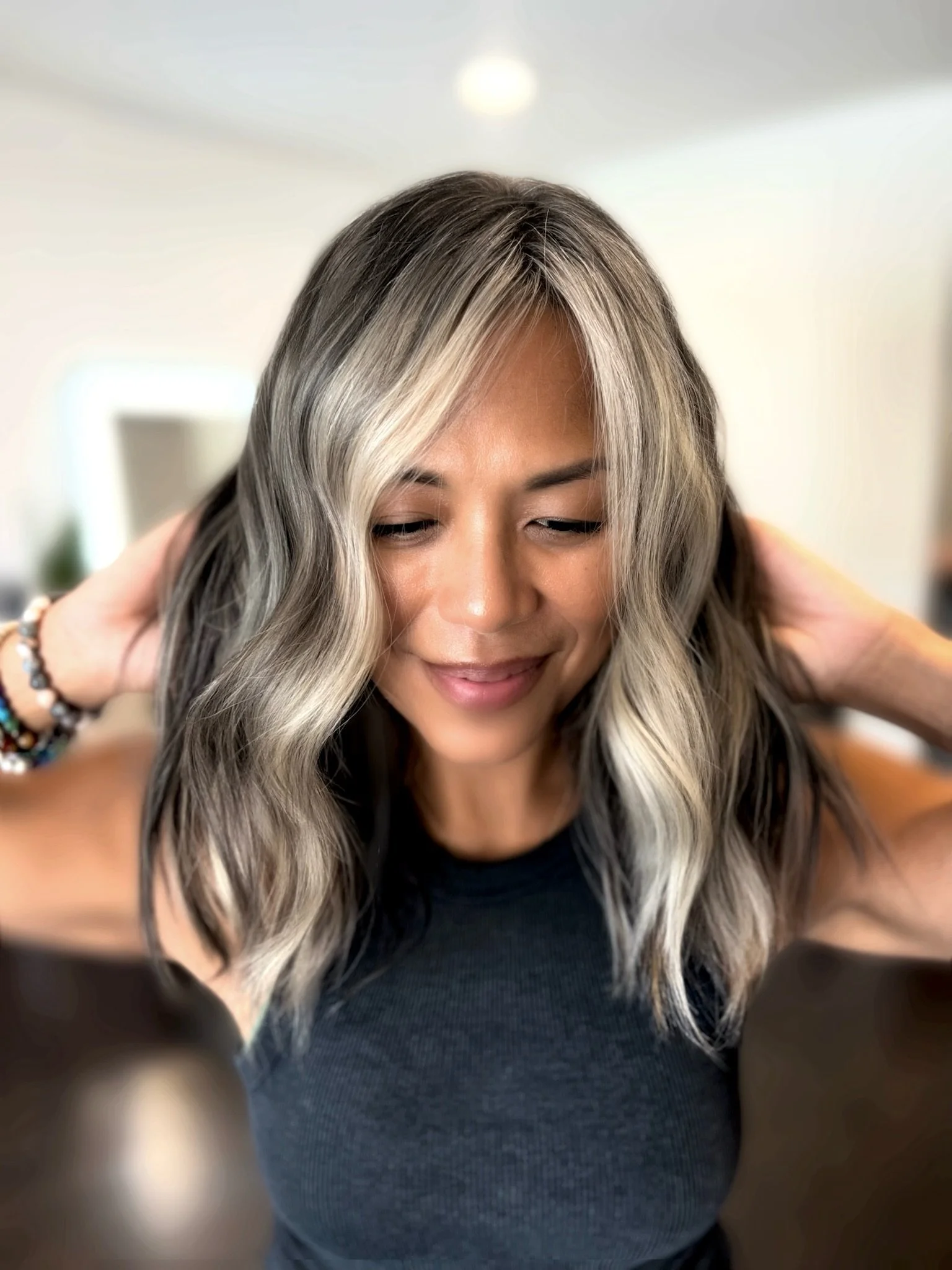Completed hair transformation by Dalina Rivas featuring custom hair color, personalized haircut, and healthy hair treatment.
