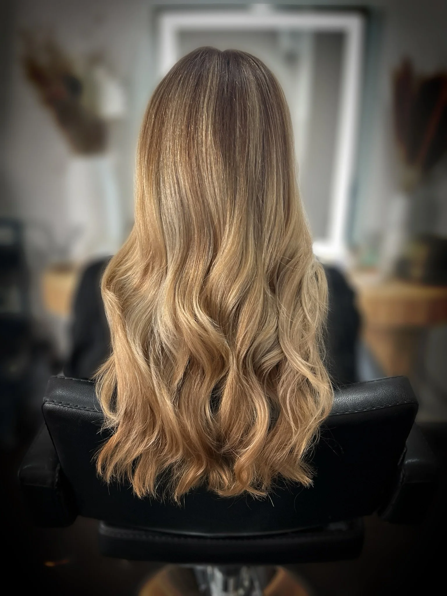 Completed hair transformation by Dalina Rivas featuring custom hair color, personalized haircut, and healthy hair treatment.