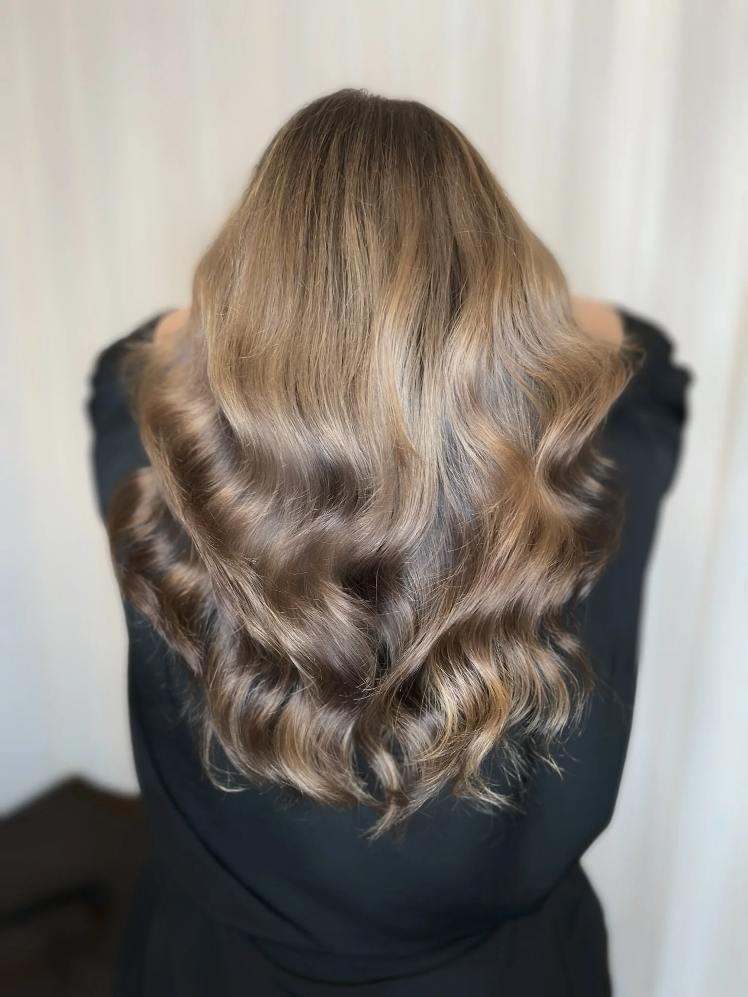 Completed hair transformation by Dalina Rivas featuring custom hair color, personalized haircut, and healthy hair treatment.