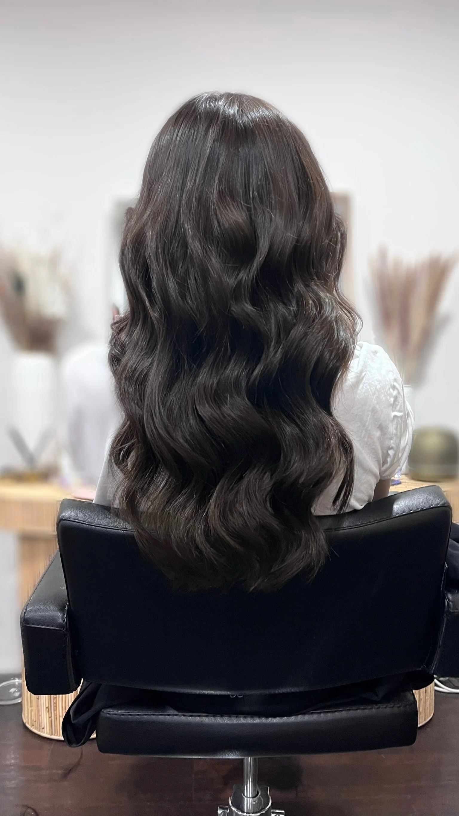 Completed hair transformation by Dalina Rivas featuring custom hair color, personalized haircut, and healthy hair treatment.