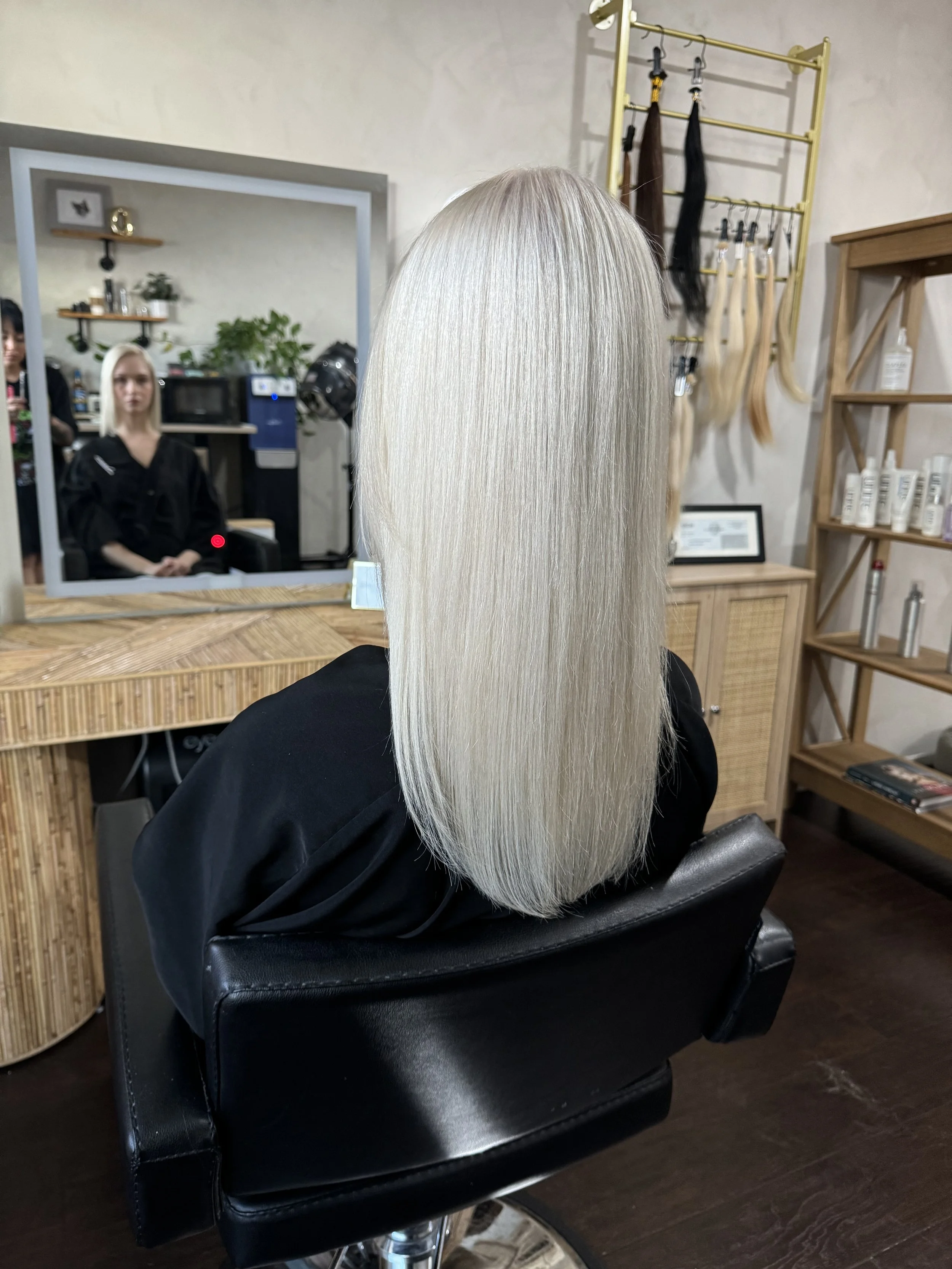 Long platinum blonde hair transformation at The Dalina Way hair studio in Toluca Lake.