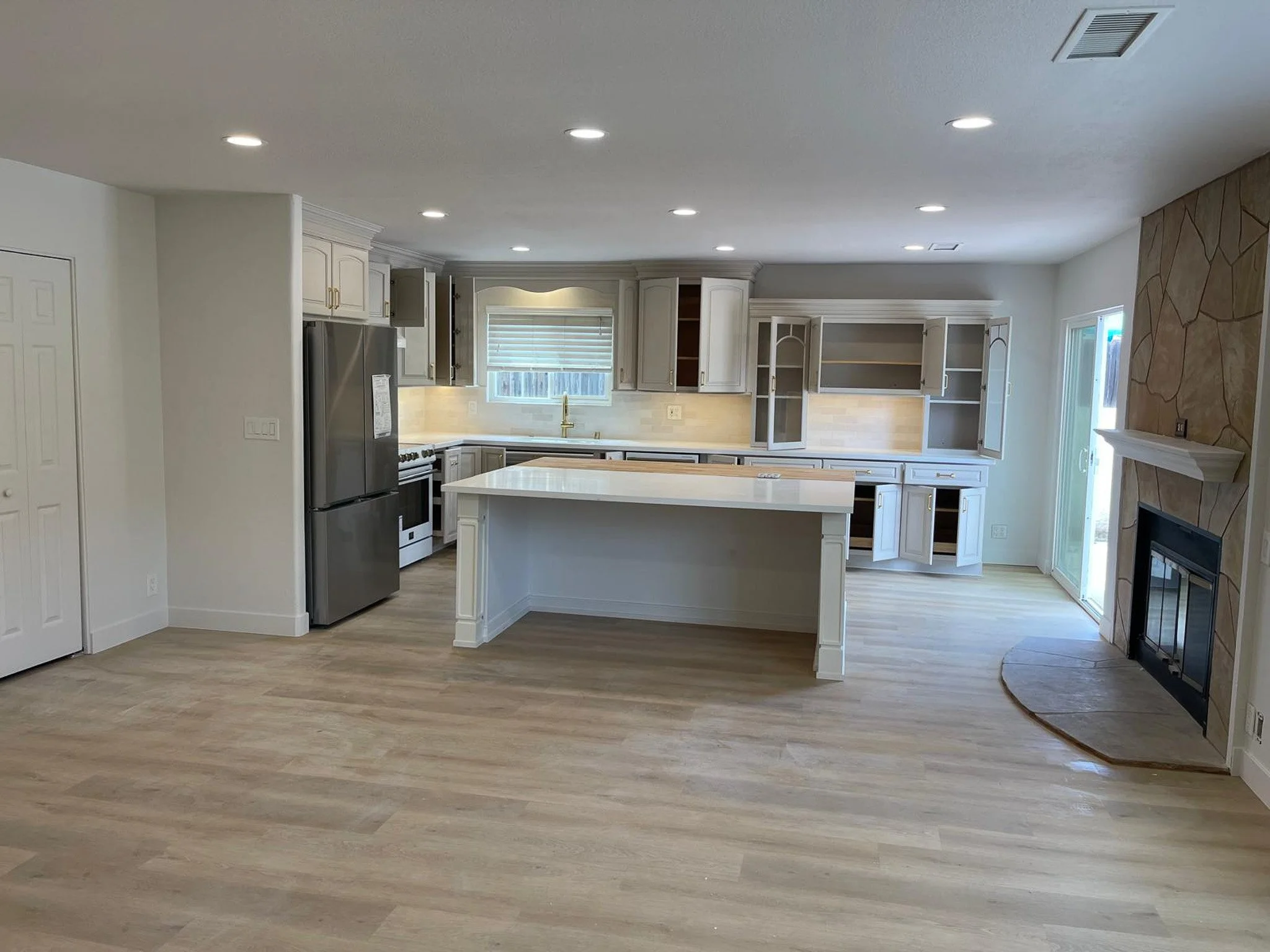 Open-Concept Living: A Coastal Kitchen &amp; Flooring Transformation
