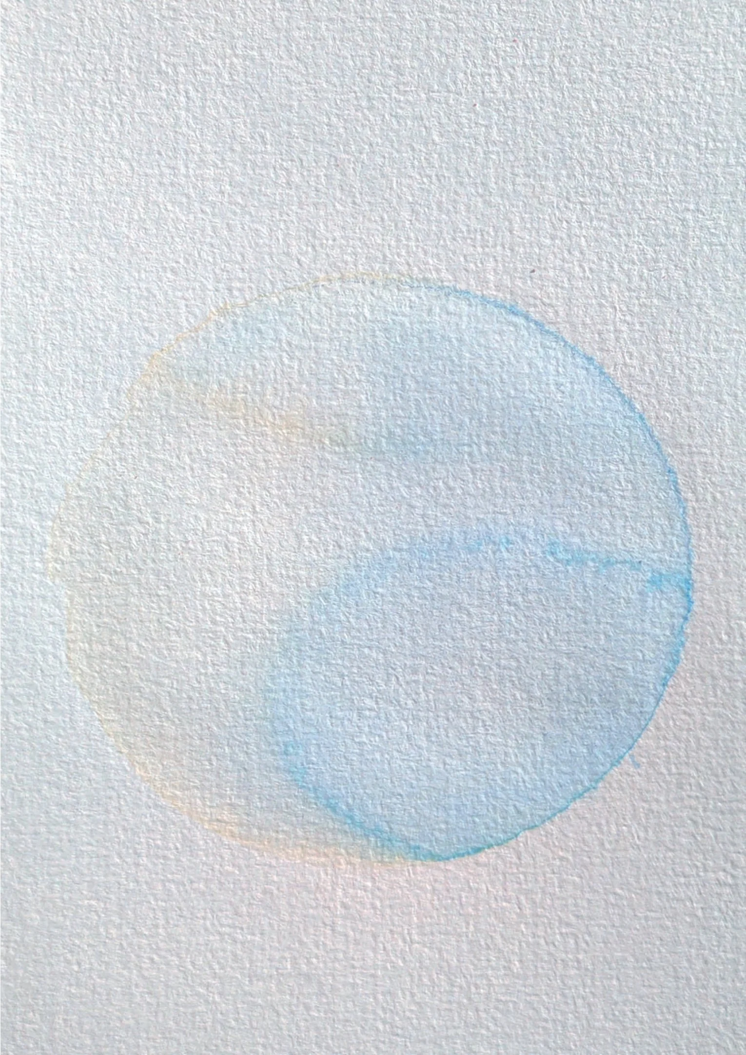 A textured paper with a faint, colorful, semi-circular pencil drawing.