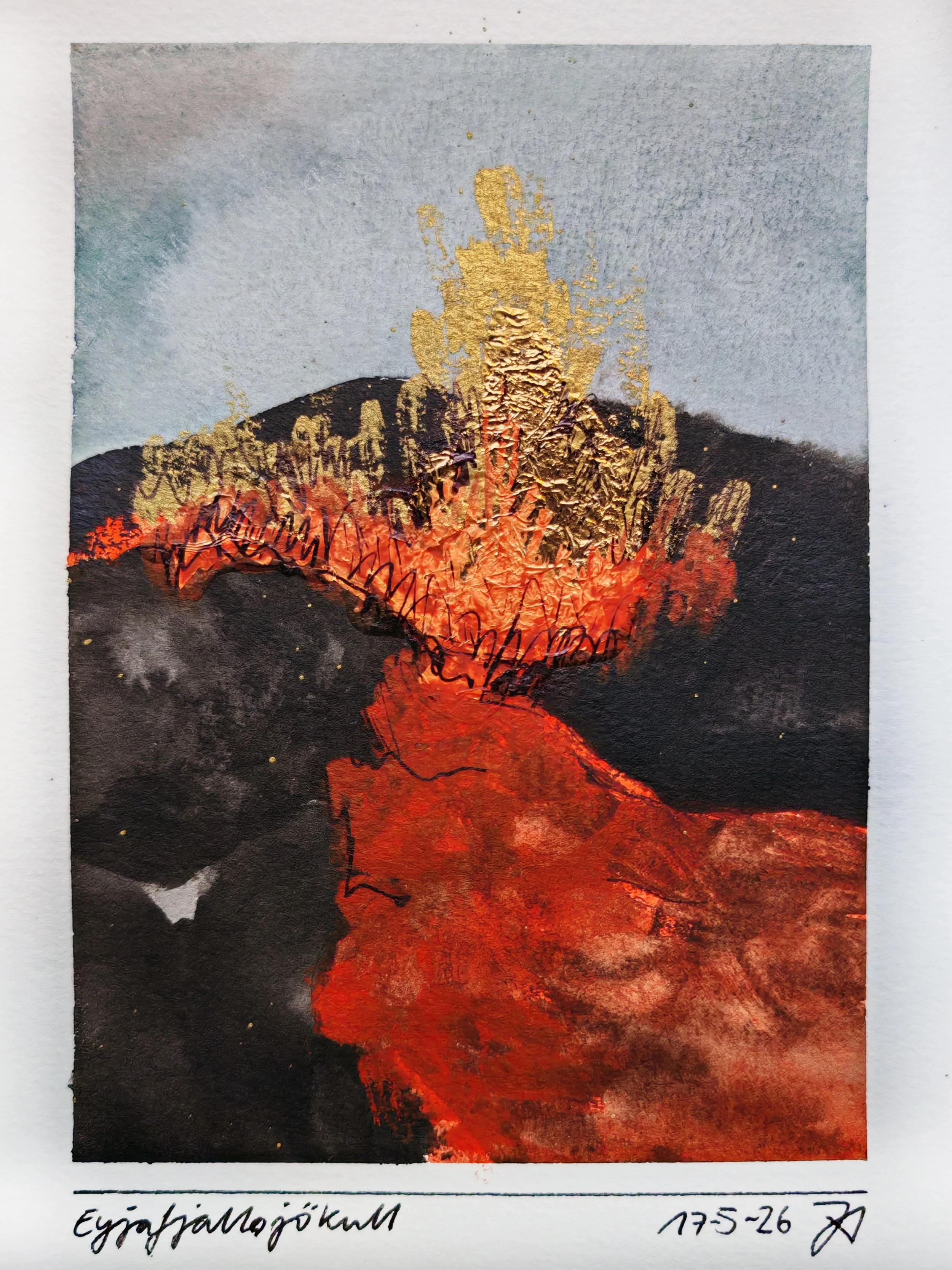 A weathered photograph of an erupting volcano with lava flowing down its sides, under a cloudy sky, with handwritten notes and date at the bottom.