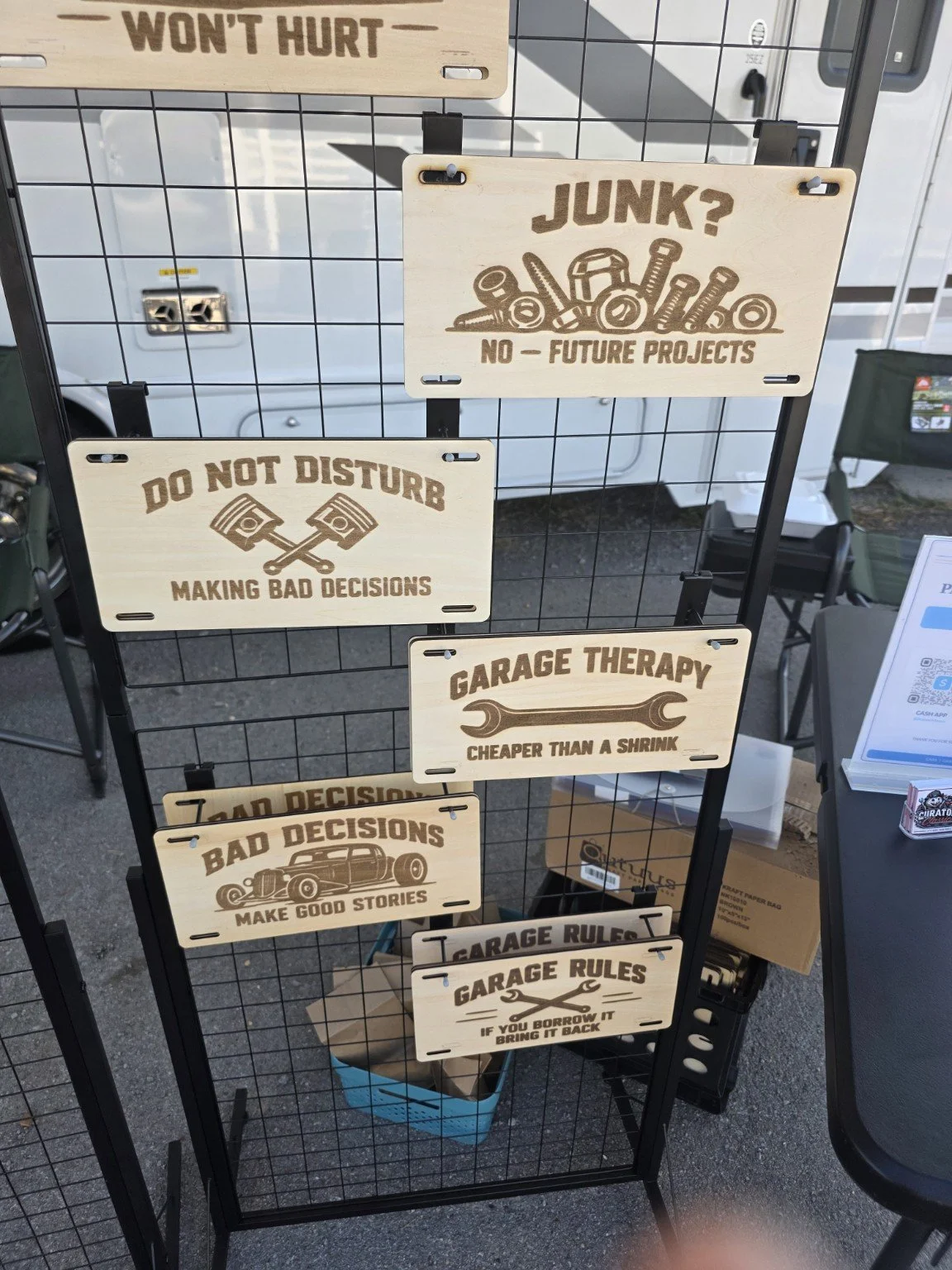 Automotive-themed wooden garage signs made by Curators Classics.
