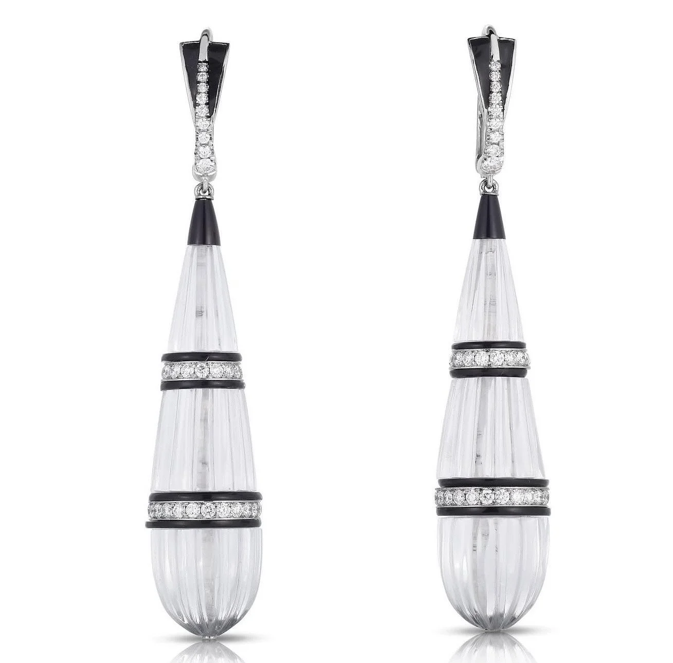 A pair of dangling earrings featuring black and clear geometric shapes and diamond accents.