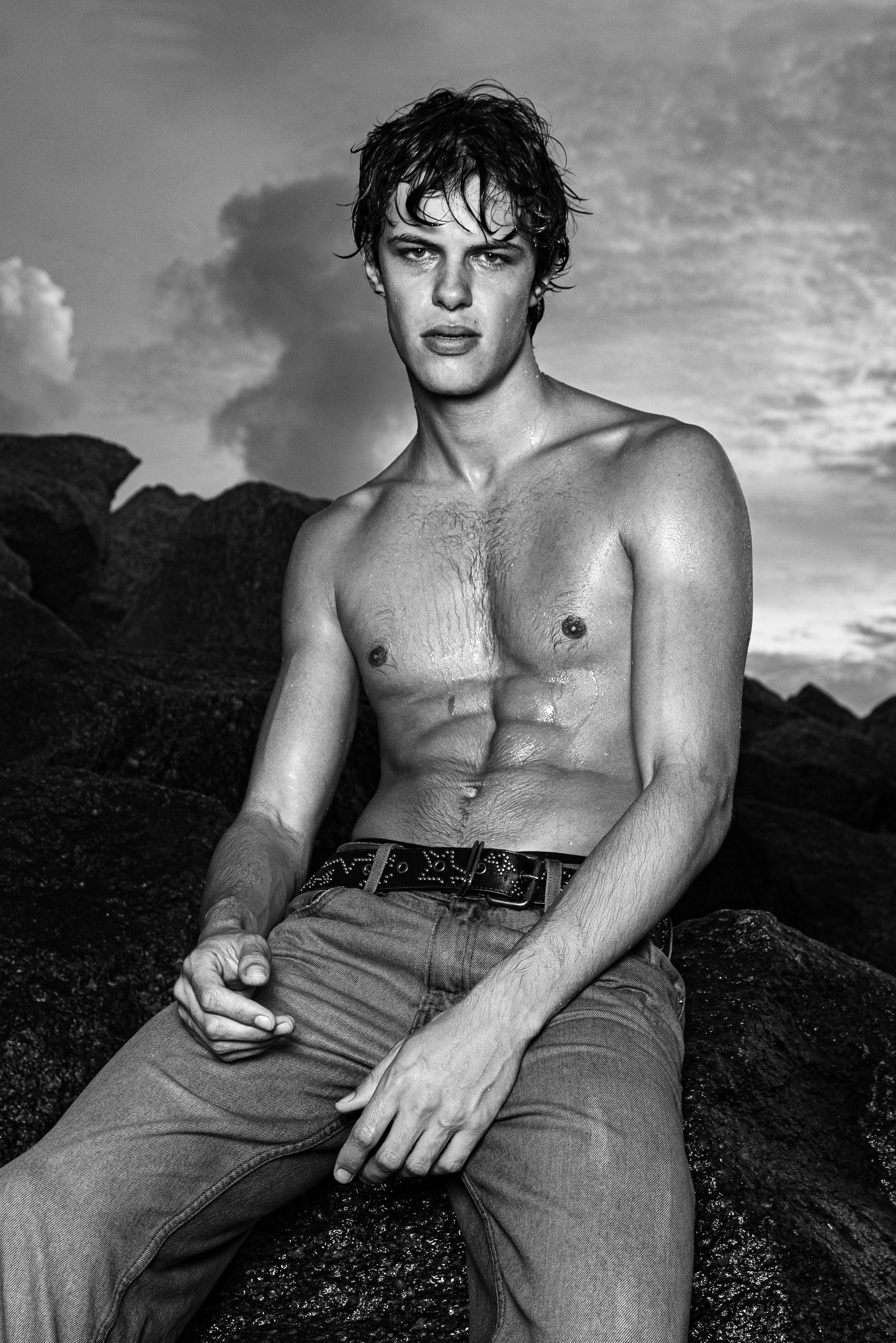 Black-and-white outdoor fashion portrait of a male model. NILS EMIL BREMER 