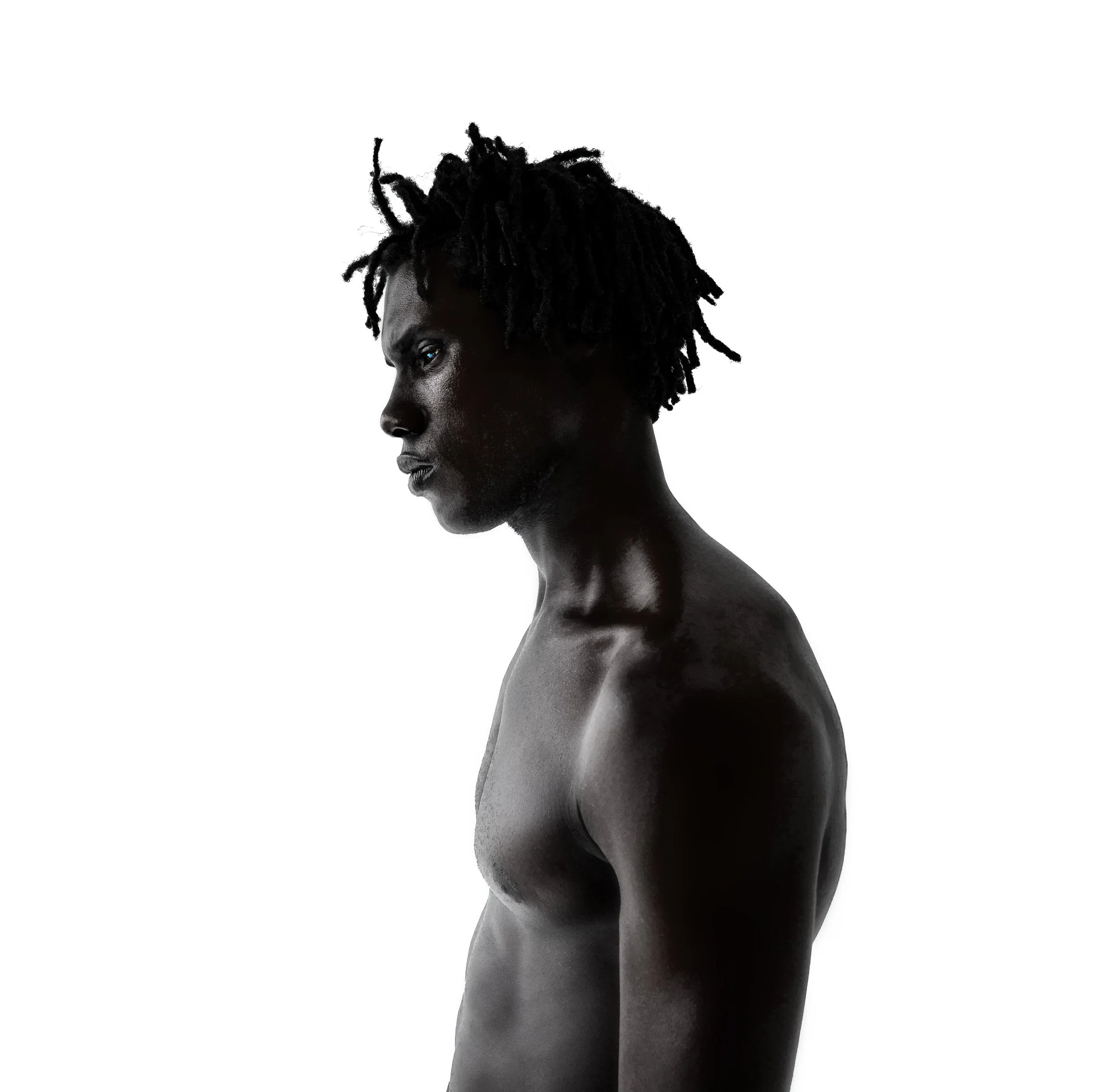 High-contrast profile portrait against a white background. LEANDRO SANTOS