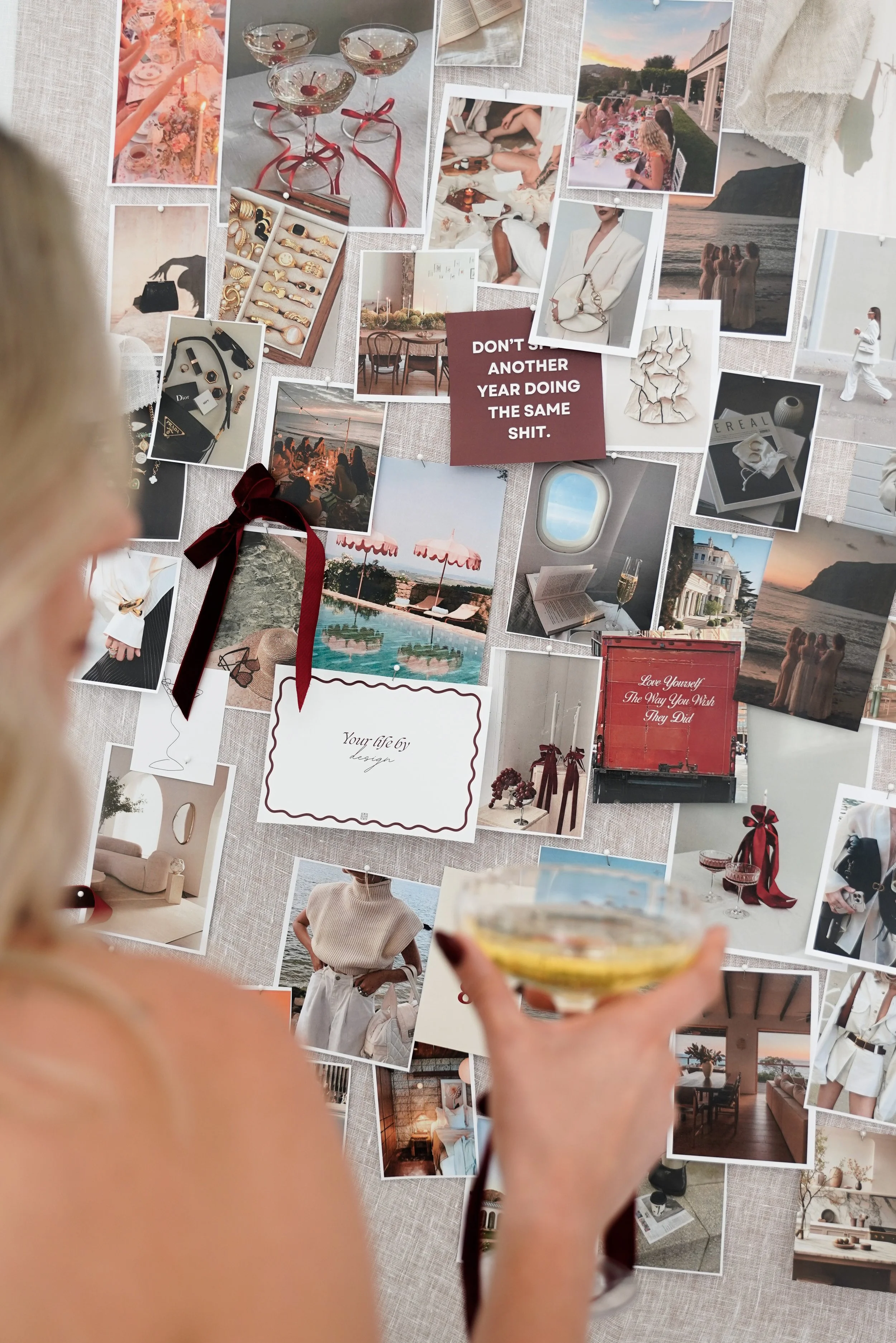 Aesthetic vision board collage of fashion, jewelry, luxury travel, dining, interiors, beach scenes, and lifestyle inspiration pinned to a fabric backdrop.