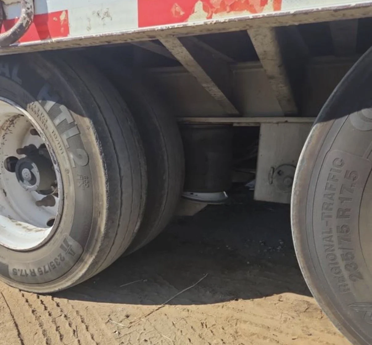 1. 2008 Trail King equipment trailer, close-up showing trailer tires and wheels.
Let's start!