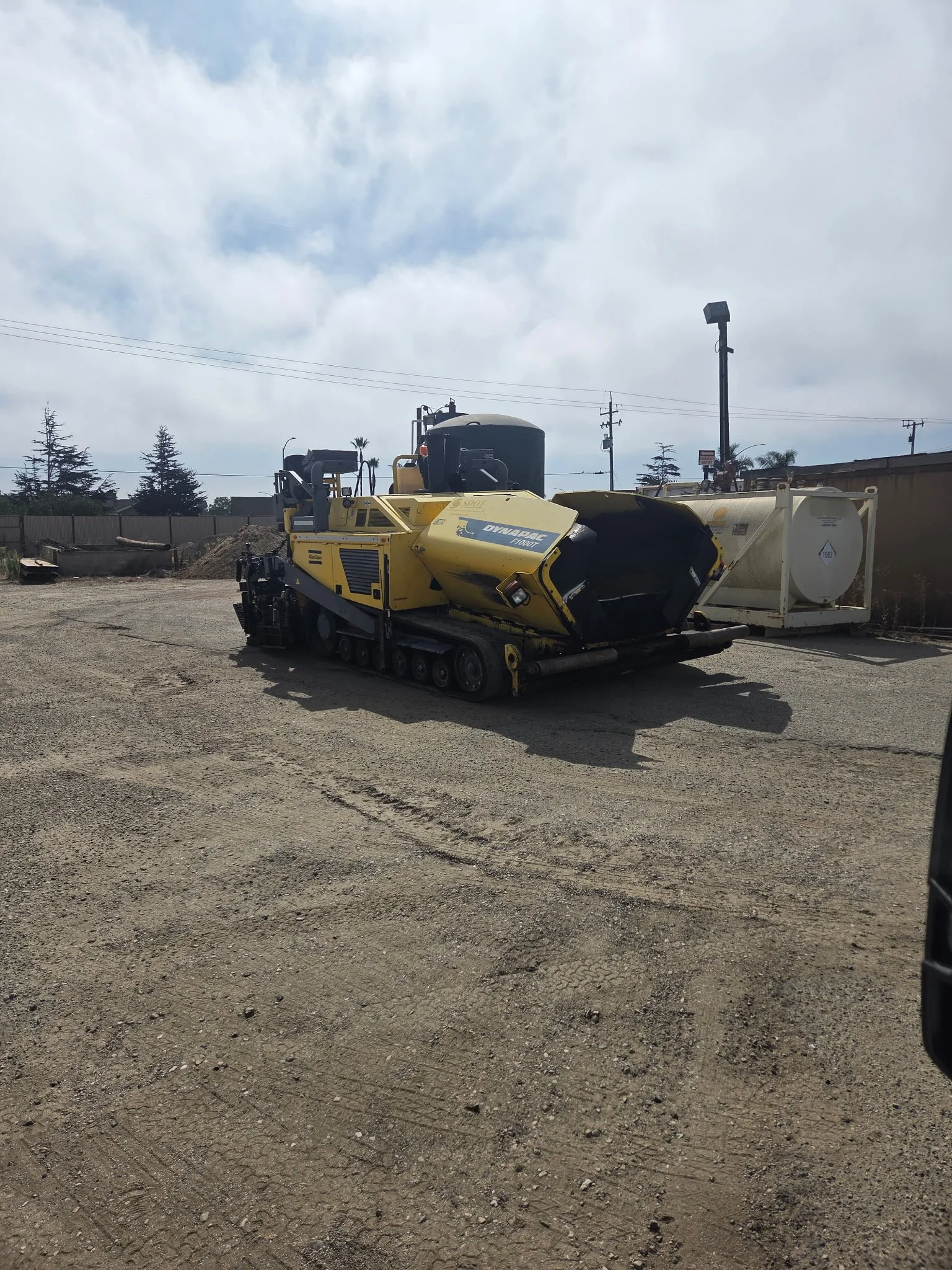 2017 Dynapac F1000T asphalt paver, exterior view parked in an equipment yard.