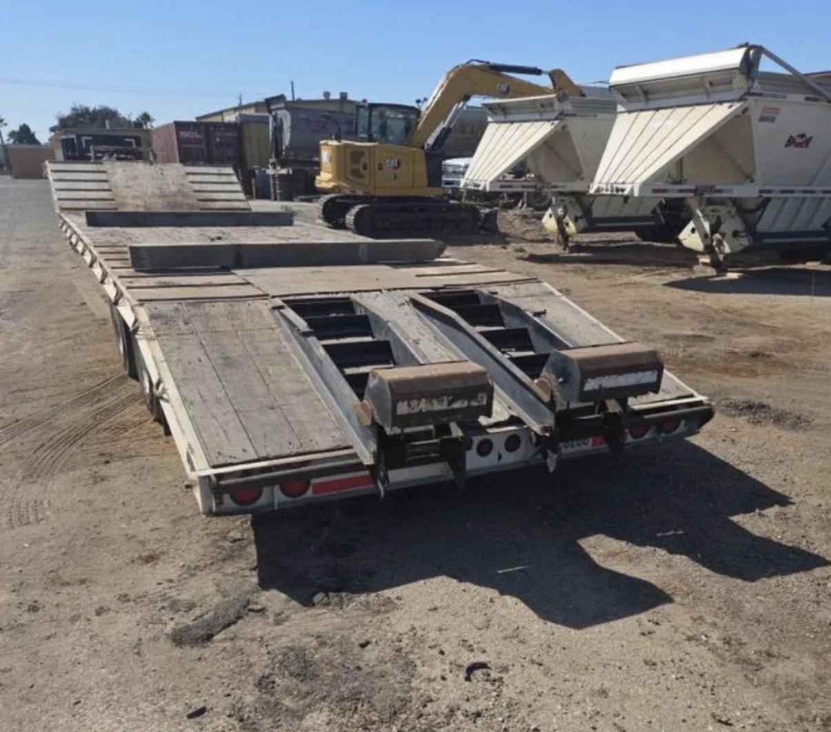 2008 Trail King equipment trailer, rear view showing loading ramps.