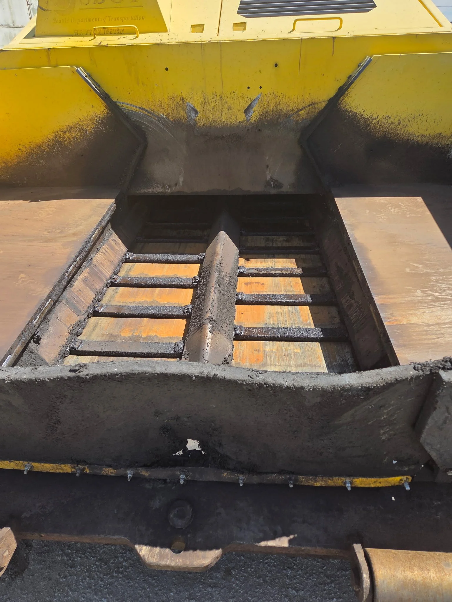 2017 Dynapac F1000T asphalt paver, close-up showing front hopper and material-feeding area.