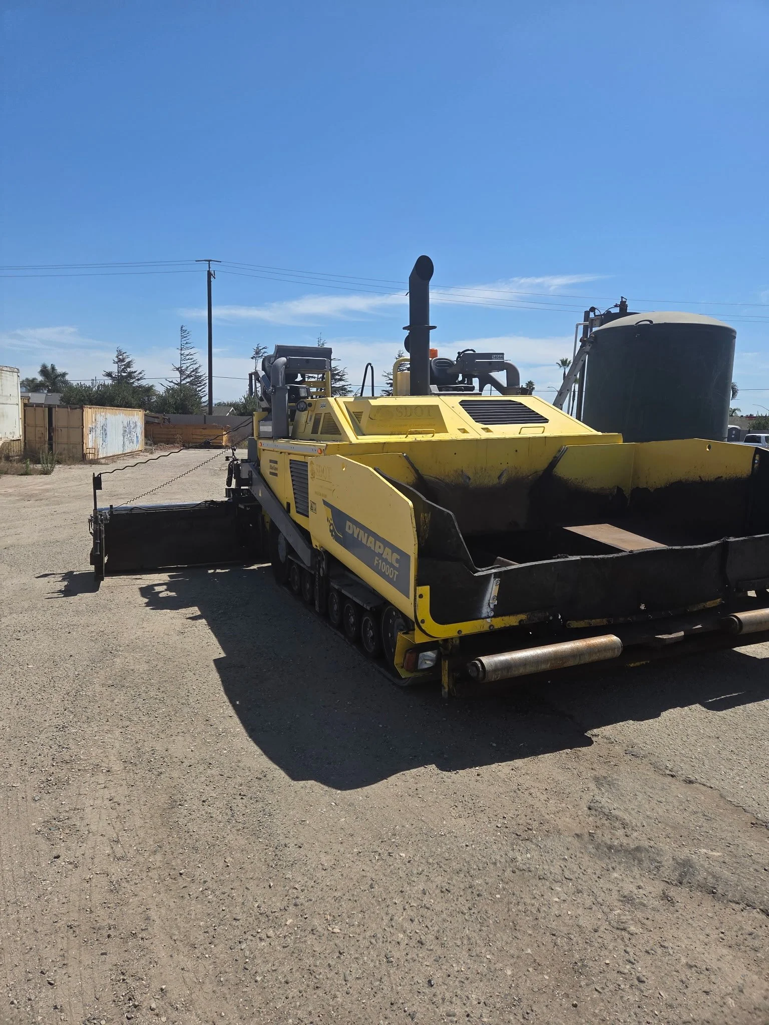 2017 Dynapac F1000T asphalt paver, rear exterior view showing the paving equipment.